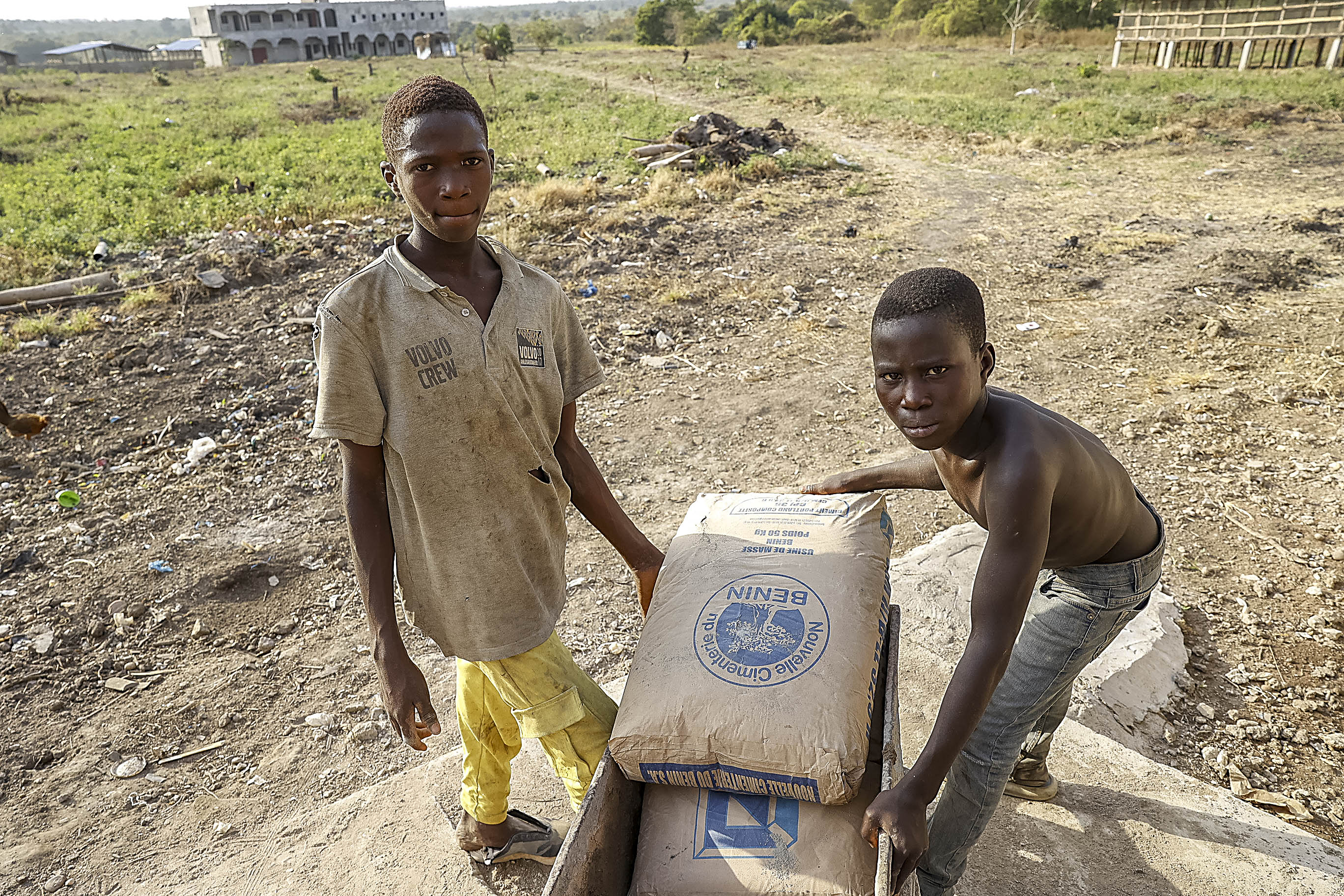Child workers working on a building site in Benin. (Photo by: Godong/Universal Images Group via Getty Images)