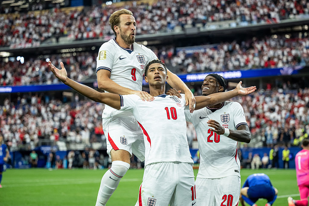 Jude Bellingham of England (C) celebrates after scoring his team's third goal with Harry Kane (L) and Noni Madueke (R) during the FIFA World Cup 2026 Group L match