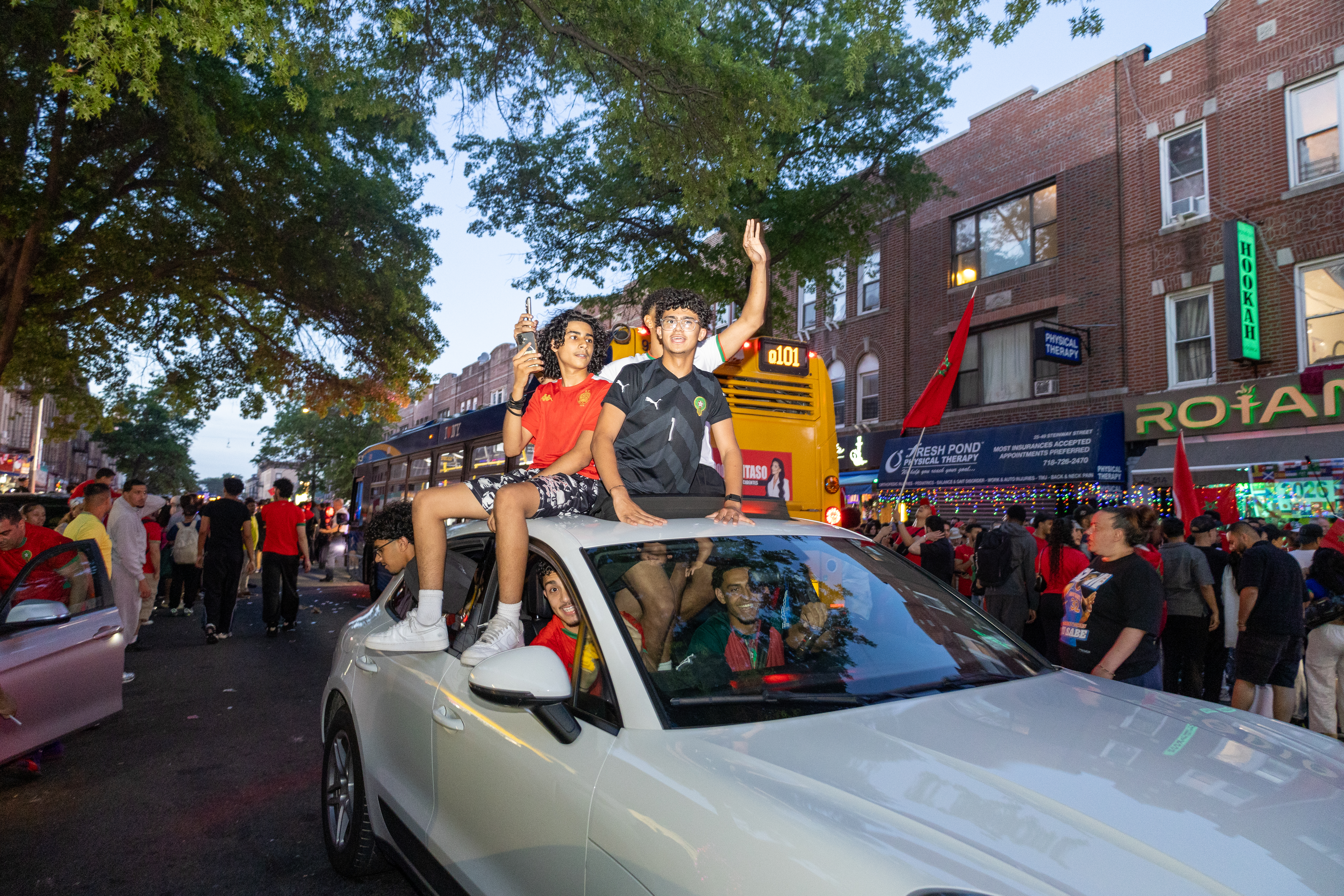 Fans watch Morocco vs Haiti at a screening in New York [Daleelah Saleh/Al Jazeera]