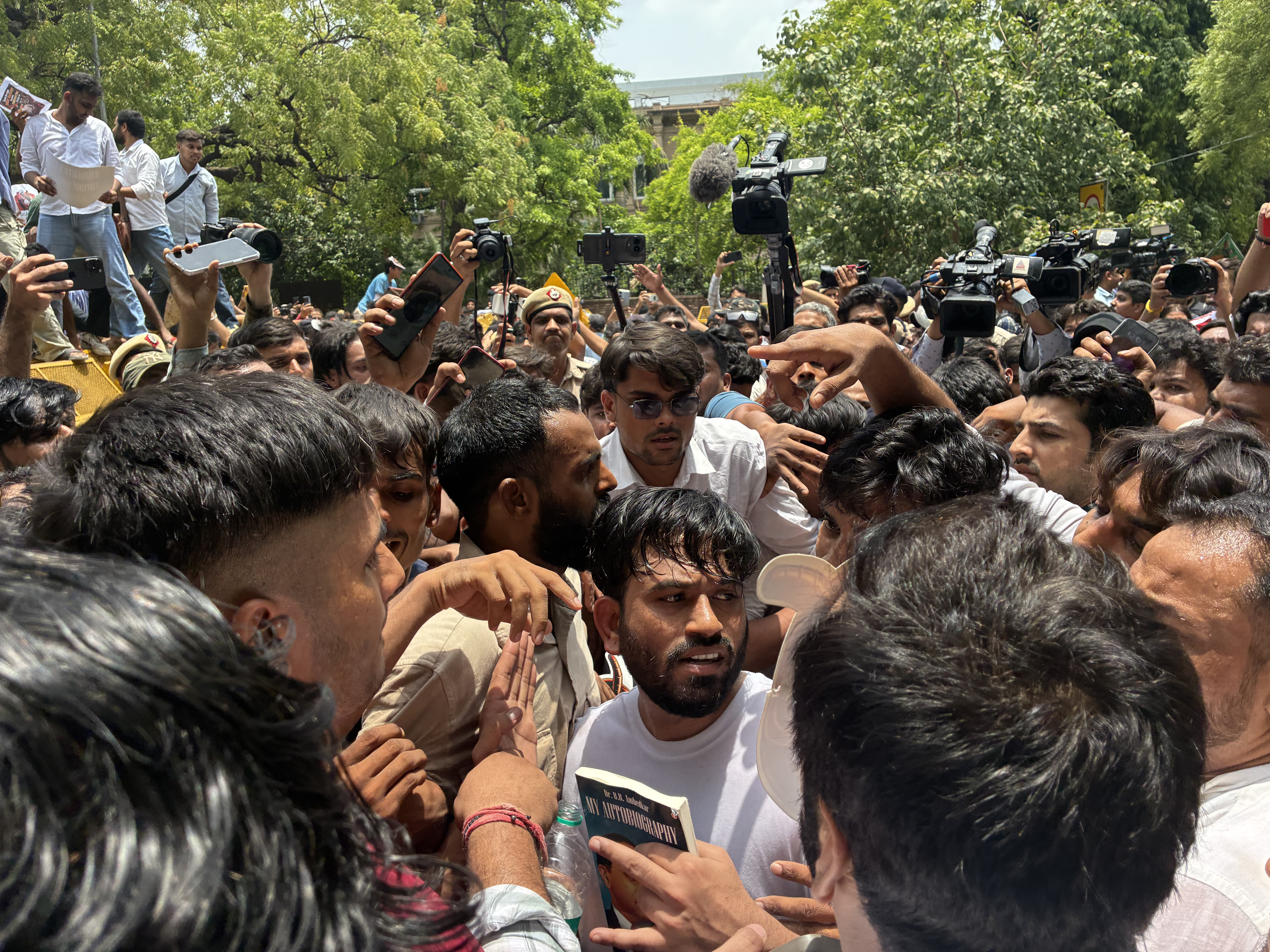 Dipke is surrounded by supporters during a protest at Jantar Mantar on June 6, 2026