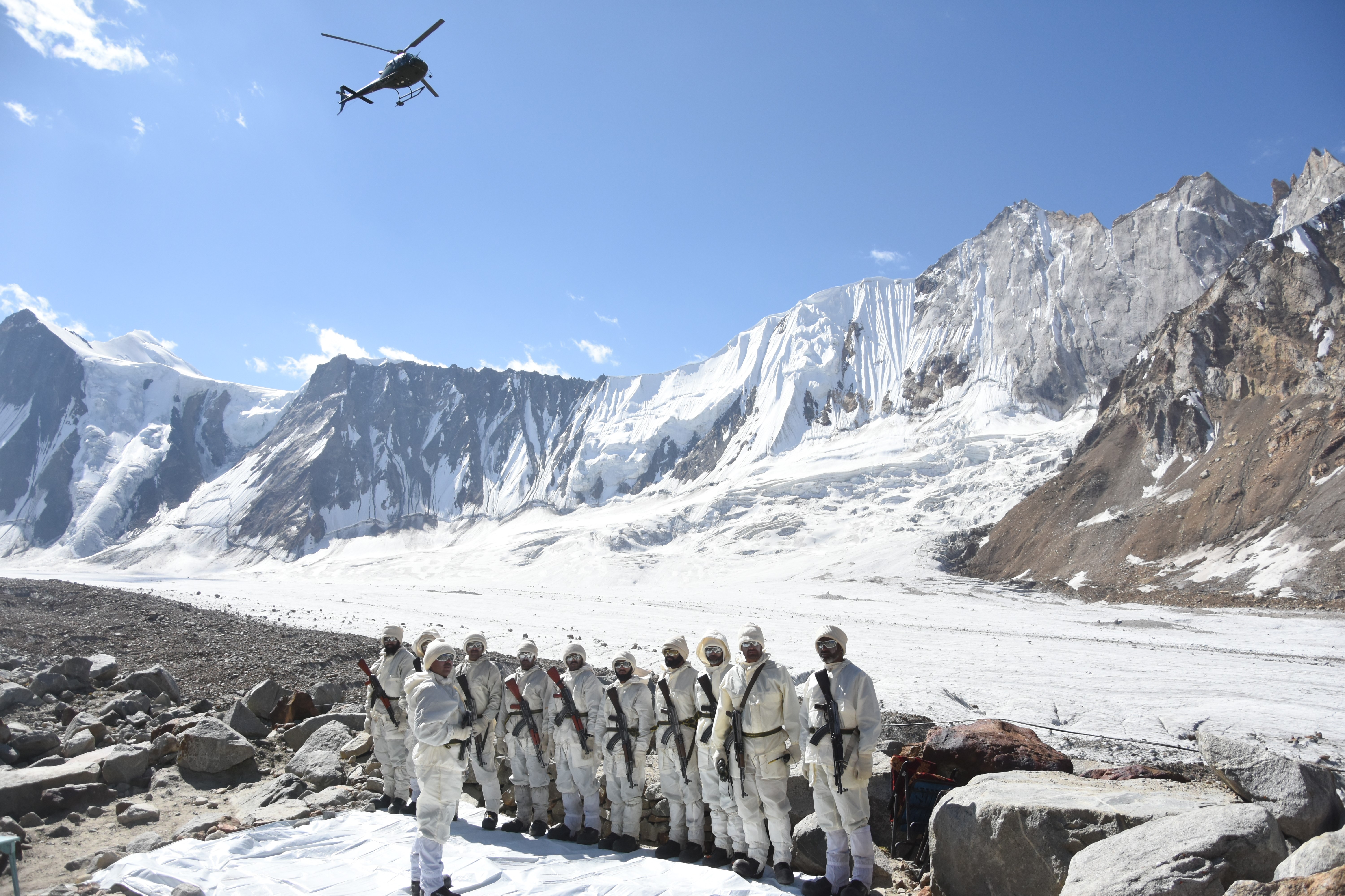 SIACHEN, PAKISTAN- SEPTEMBER 16: Pakistani soldiers patrol where India and Pakistan both claim the area and have thousands of soldiers stationed there in Siachen, Pakistan on September 16, 2019. At a height of up to 8,000 meters, Siachen is regarded as the world's highest battlefield due to military conflict between India and Pakistan which was started in 1984. Military life in the region is viewed by Anadolu Agency for the first time in international media. (Photo by Behlul Cetinkaya/Anadolu Agency via Getty Images)