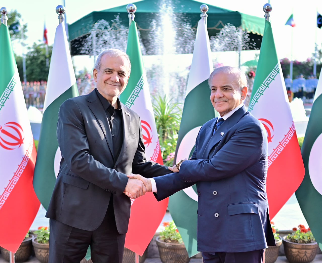 Iranian President Masoud Pezeshkian, left, meets Pakistani Prime Minister Shehbaz Sharif in Islamabad on his daylong visit to Islamabad on June 23, 2026, his first visit outside Tehran since the US-Israel war on Iran began in February
