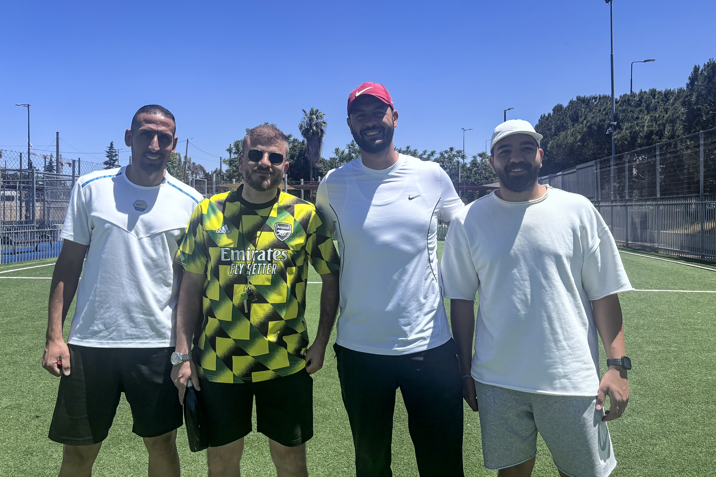 Abu Dalu alongside former players including Khalil and Mustafa