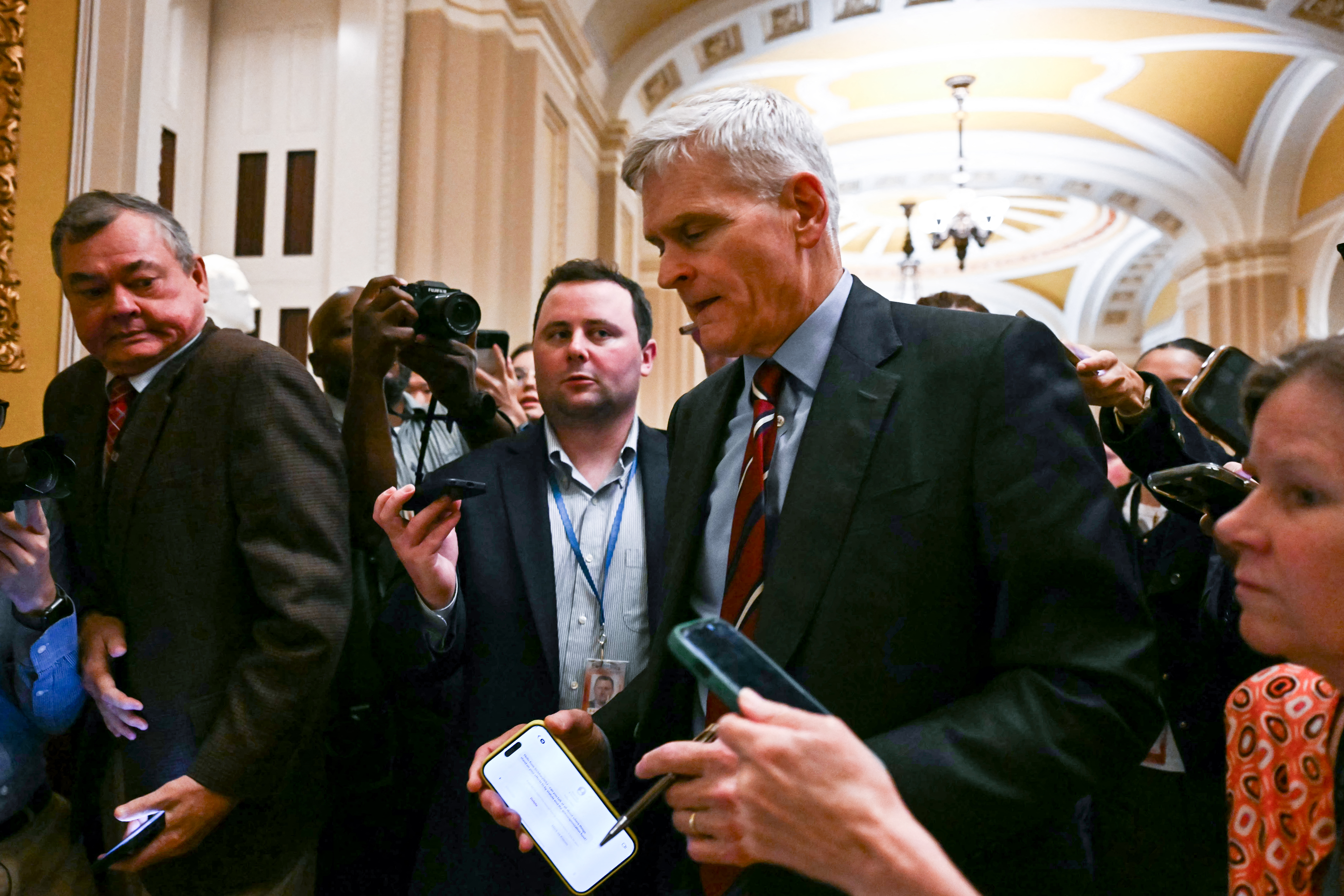 US Senator Bill Cassidy, Republican from Louisiana, speaks with reporters as he walks to a meeting with Senate Republicans at the US Capitol in Washington, DC, on June 4, 2026.