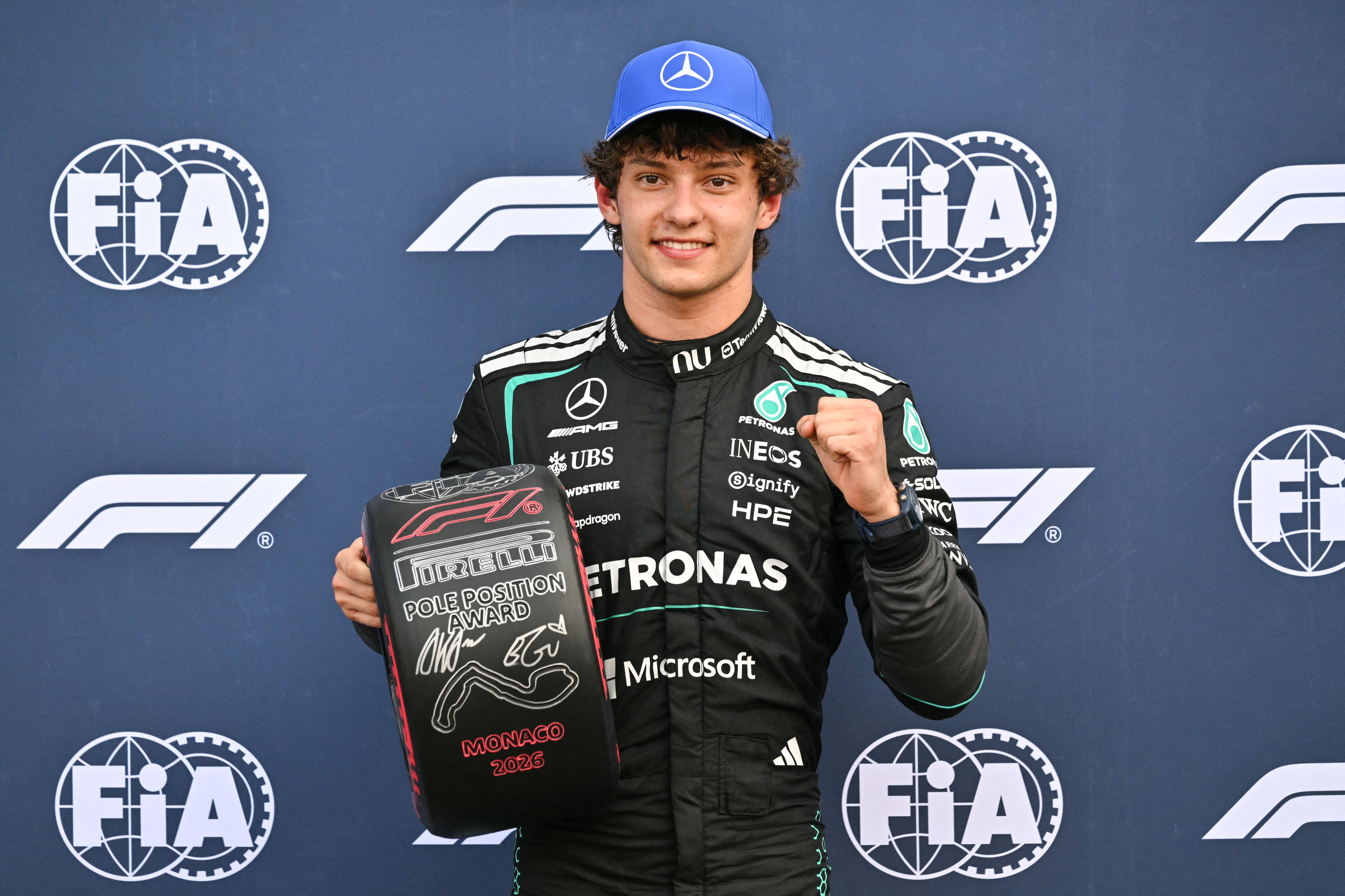 Kimi Antonelli, Italian driver of Mercedes, celebrates after winning
