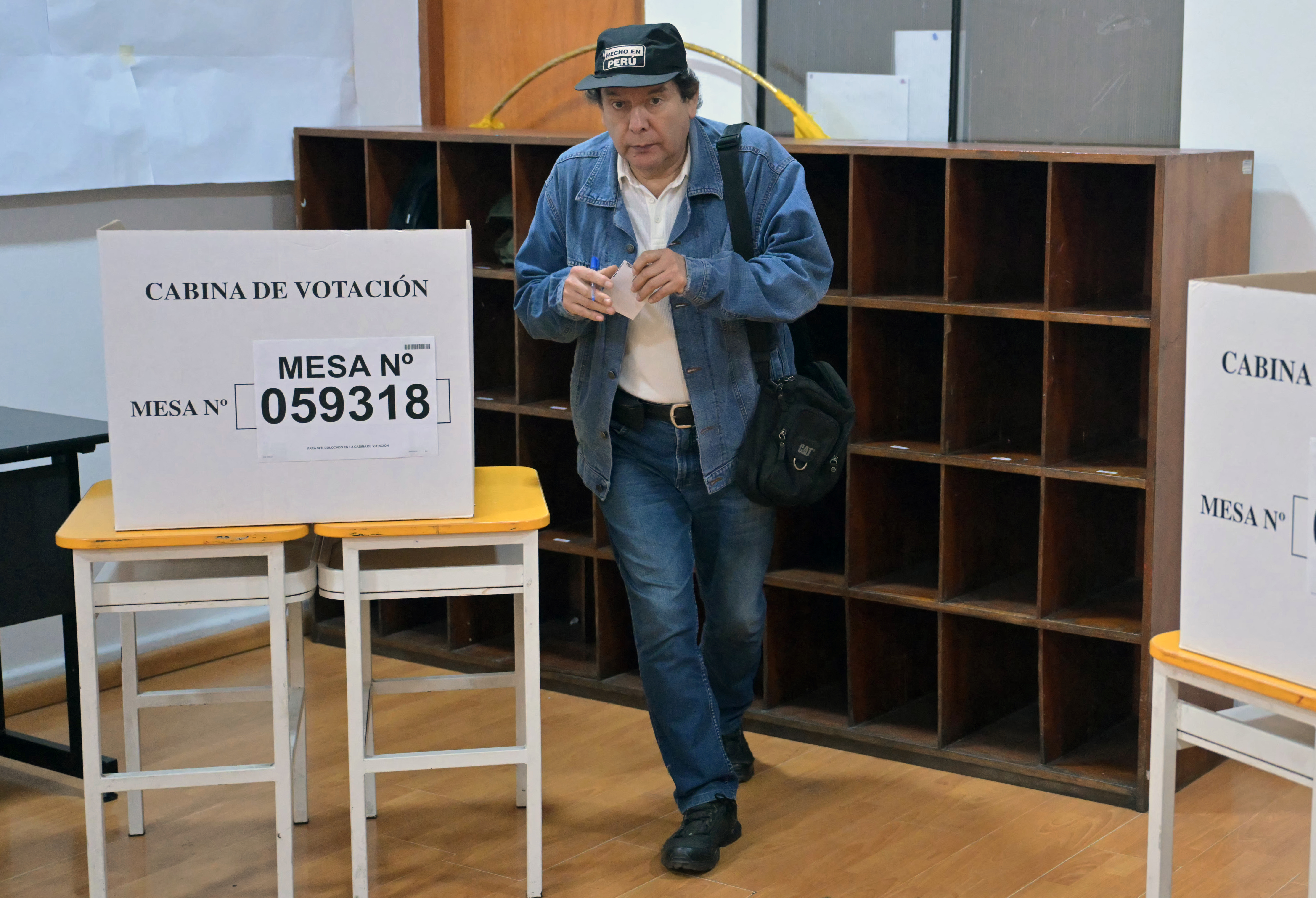 A man votes during the presidential election runoff in Lima on June 7, 2026.