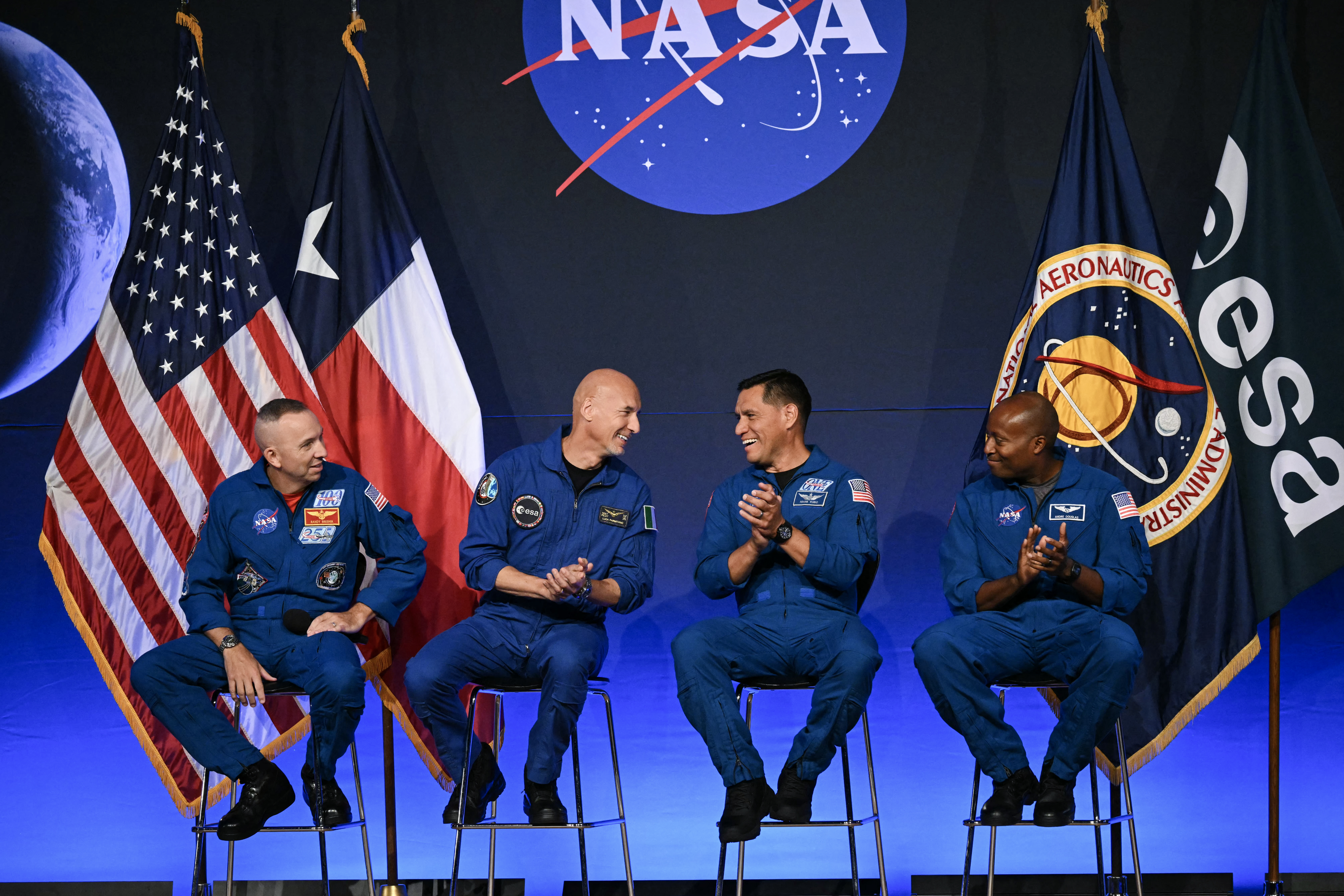 (L/R) NASA astronaut commander Randy Bresnik, ESA (European Space Agency) astronaut pilot Luca Parmitano, NASA astronaut mission specialist Frank Rubio, and NASA astronaut mission specialist Andre Douglas speak during a press conference announcing the crew for the Artemis III mission at NASA's Johnson Space Center in Houston, Texas, on June 9, 2026.