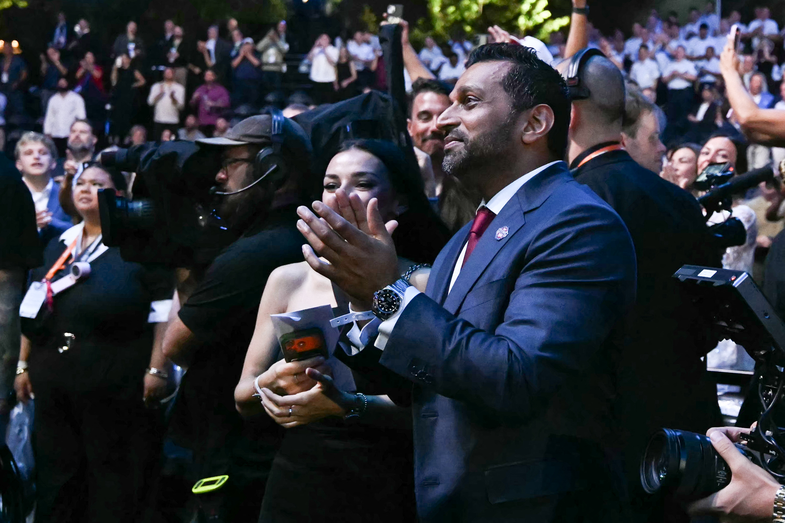 FBI Director Kash Patel applauds at the conclusion of the "UFC Freedom 250" mixed martial arts event on the South Lawn of the White House in Washington, DC, in the early morning hours of June 15, 2026.