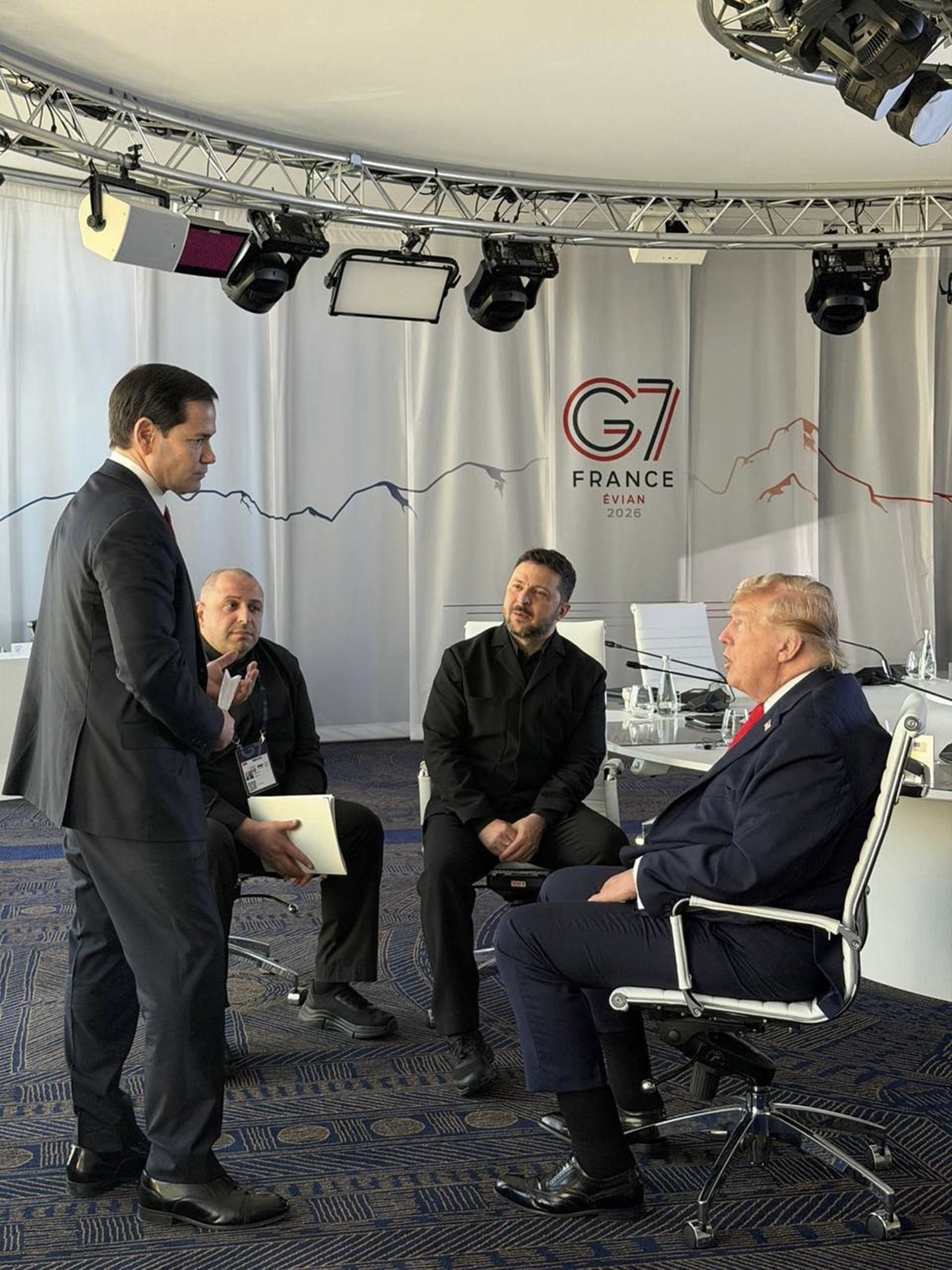 In this handout photograph taken and released by the Ukrainian Presidential Press Service on June 16, 2026, shows (L-R) US Secretary of State Marco Rubio, Ukrainian Defence Minister Rustem Umerov, Ukraine's President Volodymyr Zelensky and US President Donald Trump talking during the G7 summit, in Evian, eastern France. (Photo by Handout / UKRAINIAN PRESIDENTIAL PRESS SERVICE / AFP) / XGTY / RESTRICTED TO EDITORIAL USE - MANDATORY CREDIT "AFP PHOTO / UKRAINIAN PRESIDENTIAL PRESS SERVICE" - NO MARKETING NO ADVERTISING CAMPAIGNS - DISTRIBUTED AS A SERVICE TO CLIENTS
