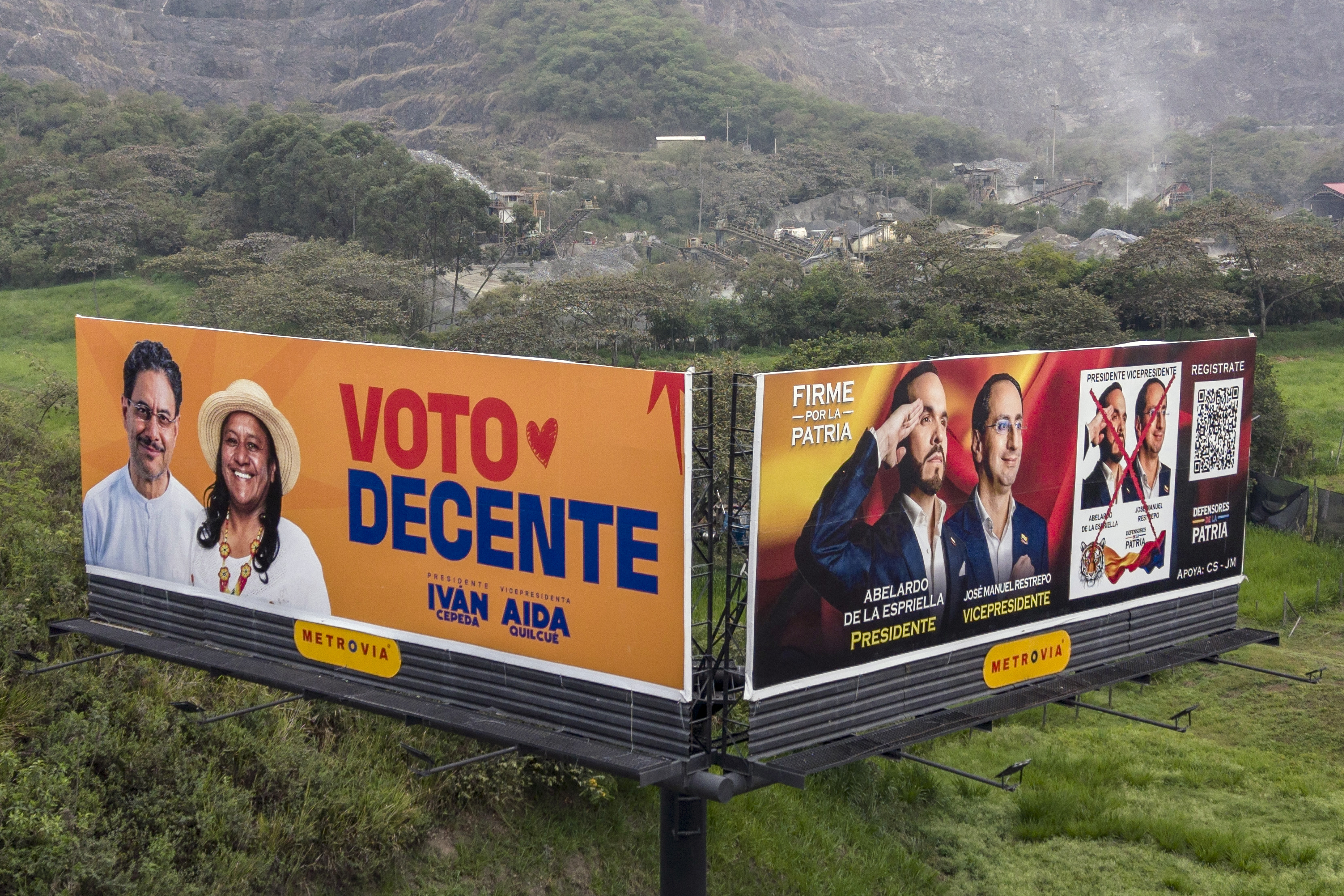 Aerial view of billboards inviting to vote for presidential canditate Abelardo de la Espriella, of the Salvadores de la Patria movement (R), and for Ivan Cepdepa, of the Pacto Historico Political Party, in the upcoming presidential election in Cali, Colombia, on June 17, 2026.