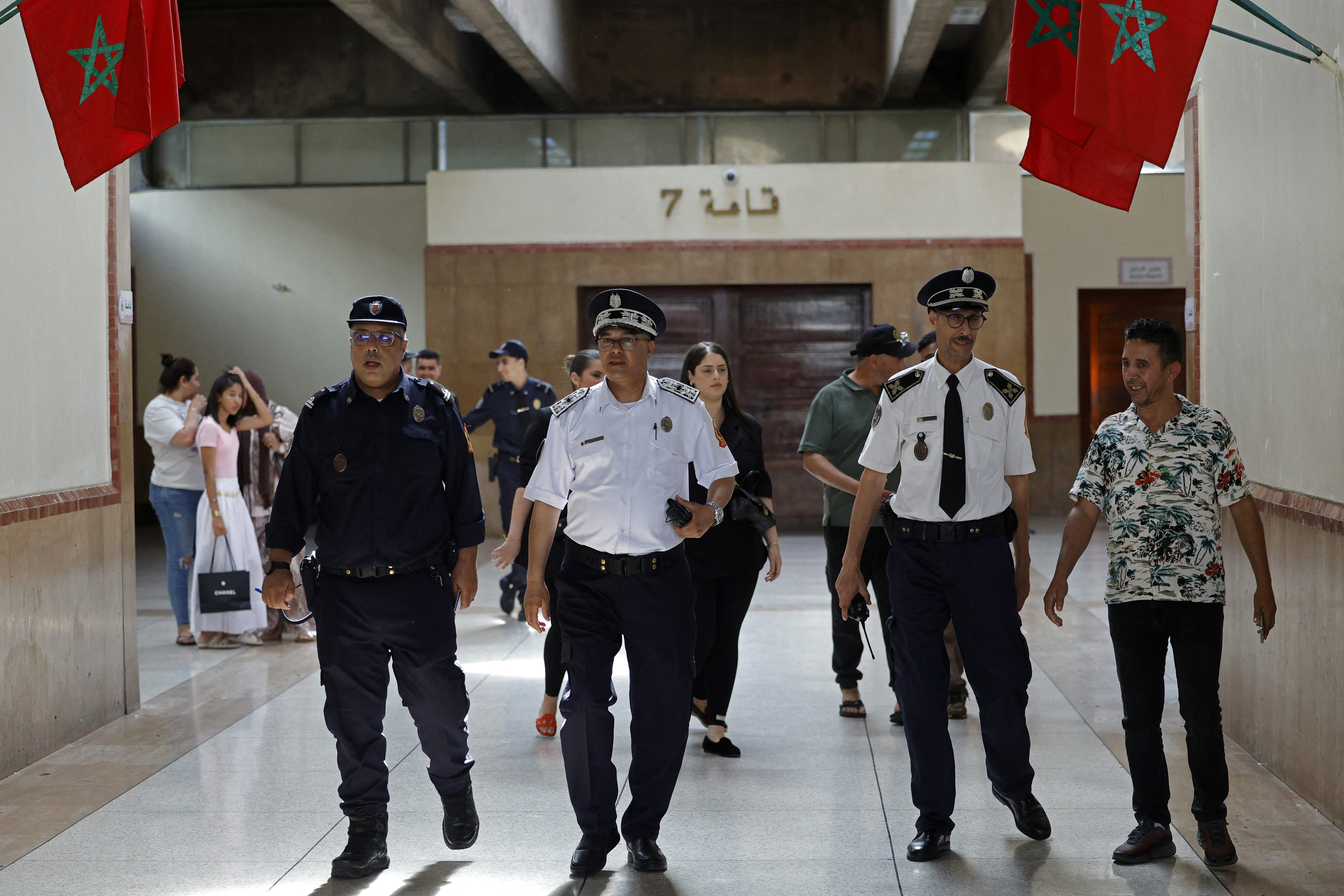Security personnel gather during the final hearing in the trial of the international drug trafficking case 'Escobar of the Sahara' at the Criminal Chamber of the Casablanca Court of Appeal, in Casablanca on June 25, 2026.