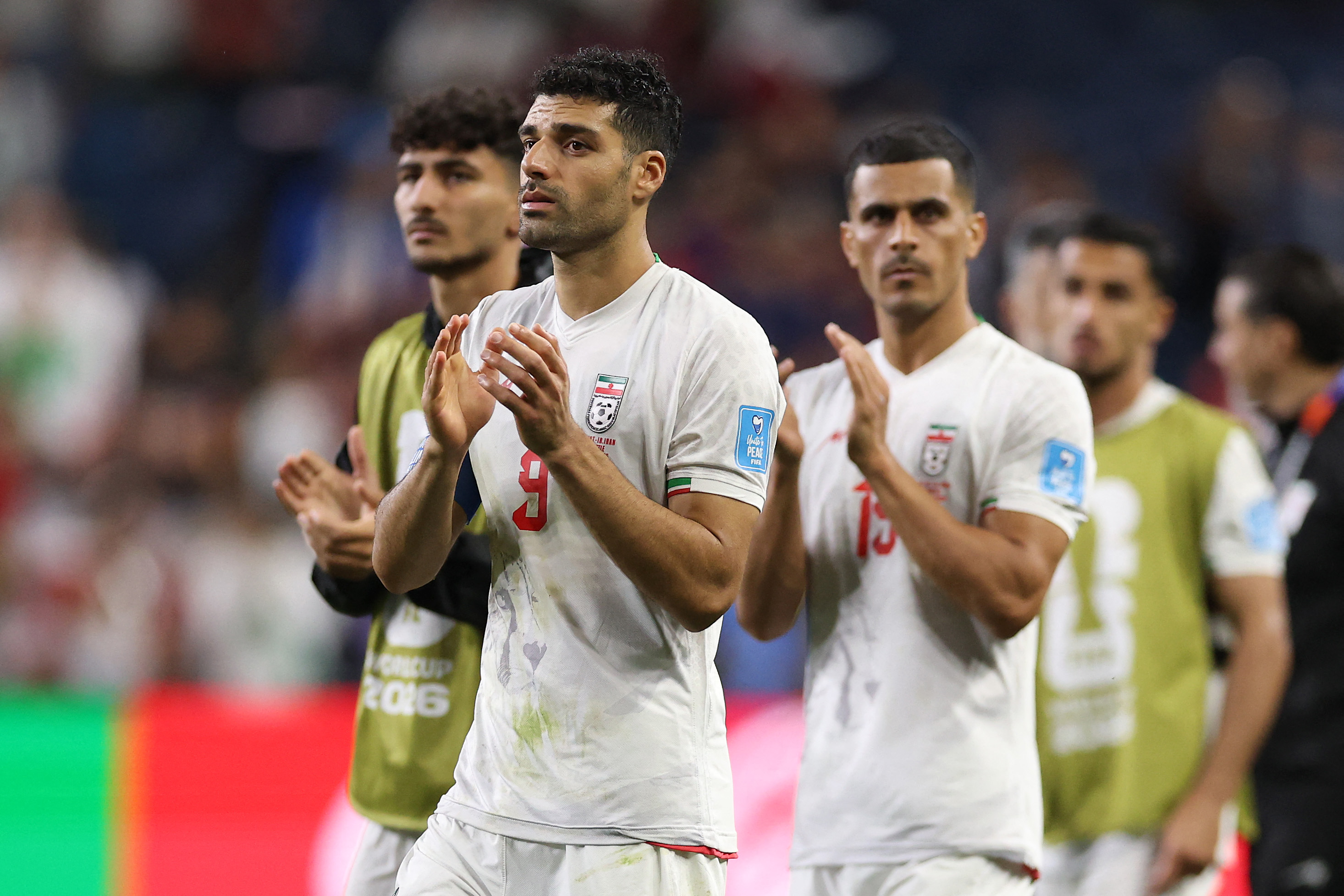 SEATTLE, WASHINGTON - JUNE 26: Mehdi Taremi #9 of IR Iran applauds fans after the 1-1 draw during the FIFA World Cup 2026 Group G match between Egypt and IR Iran at Seattle Stadium on June 26, 2026 in Seattle, Washington. Richard Heathcote/Getty Images/AFP (Photo by Richard HEATHCOTE / GETTY IMAGES NORTH AMERICA / Getty Images via AFP)