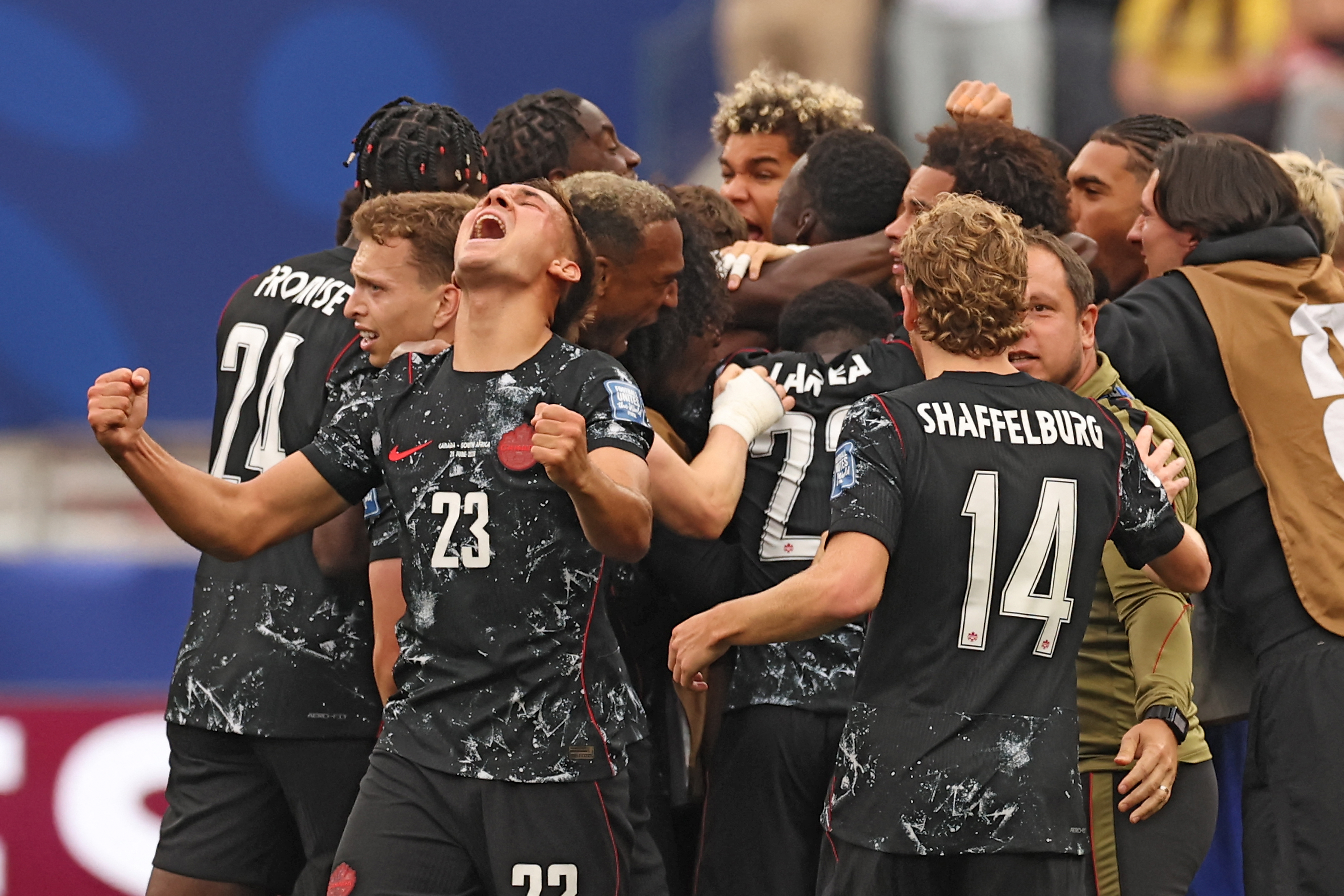 Canada's midfielder #07 Stephen Eustaquio celebrates scoring his team's first goal with teammates during the 2026 World Cup round of 32 football match between South Africa and Canada at the Los Angeles Stadium in Inglewood on June 28, 2026.