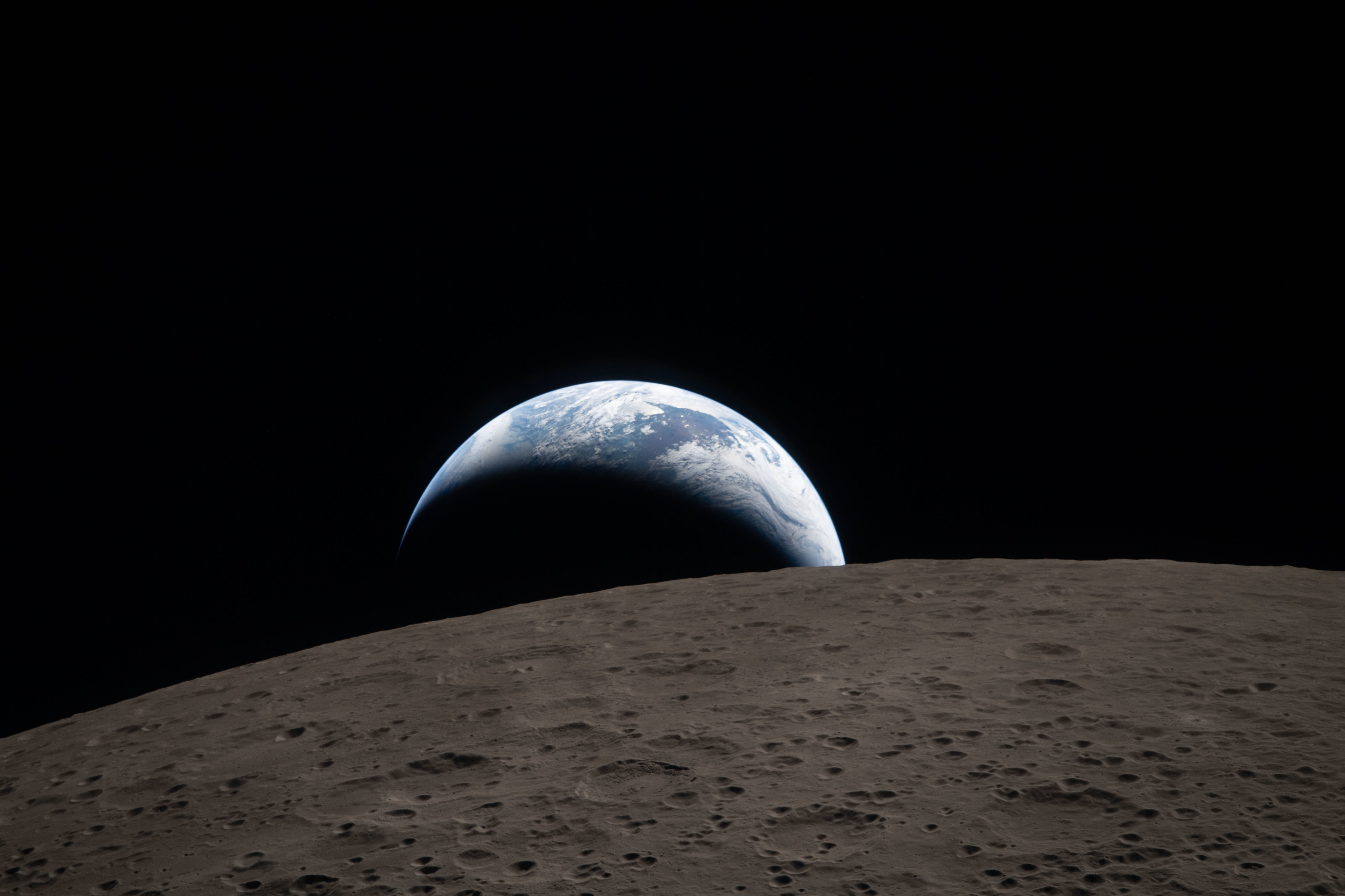 FILE - In this image provided by NASA, The Artemis II crew captured this view of an Earthset on April 6, 2026, as they flew around the Moon. (NASA via AP, File)