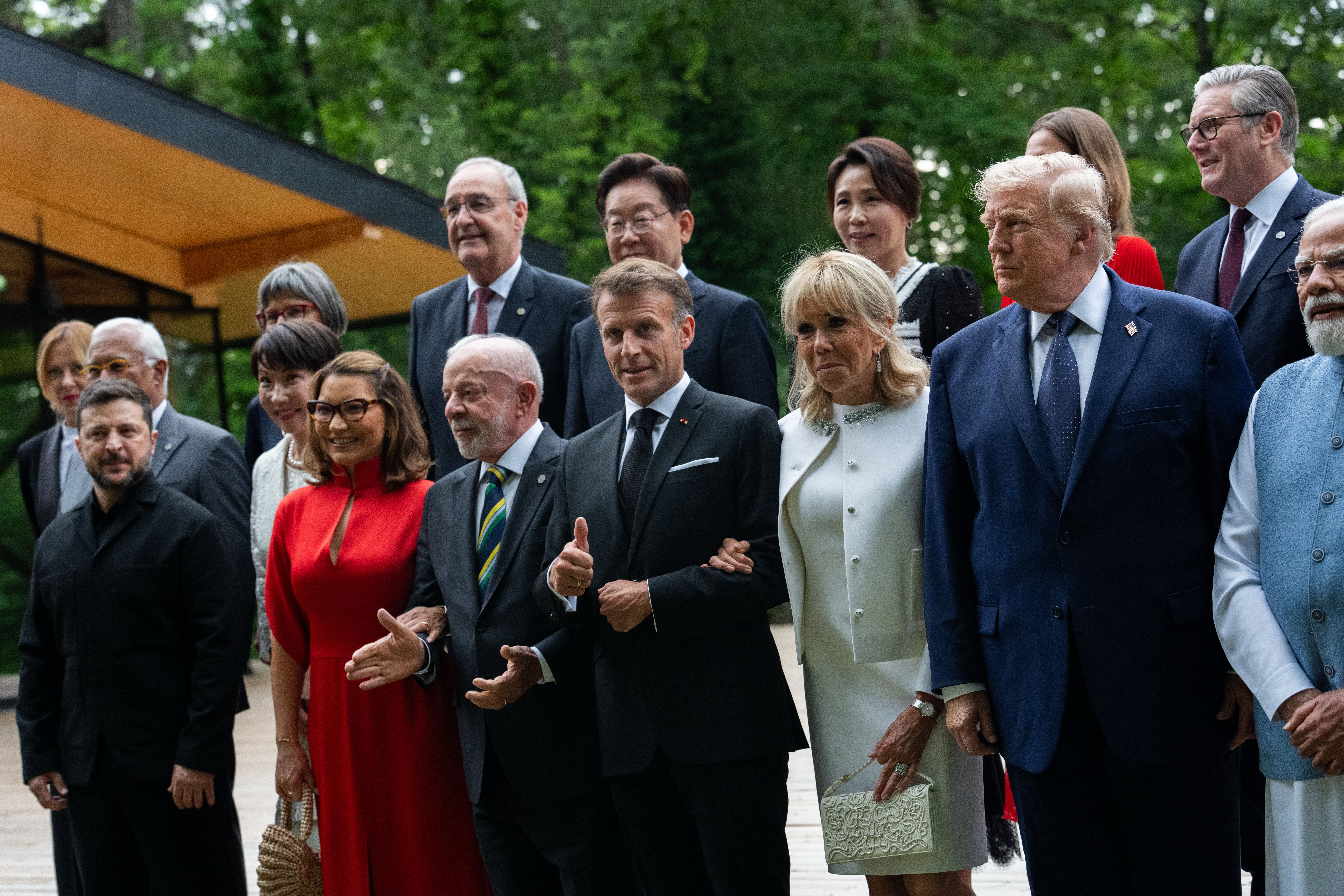 Italy's Prime Minister Giorgia Meloni, European Council President Antonio Costa, Ukraine's President Volodymyr Zelenskyy, Japan's Prime minister Sanae Takaichi, Switzerland's President Guy Parmelin, Switzerland's first lady Caroline Merotto, Brazil's President Luiz Inacio Lula da Silva, South Korea's President Lee Jae-myung, France's President Emmanuel Macron, South Korea's first lady Kim Hea Kyung, France's first lady Brigitte Macron, Britain's first lady Victoria Starmer, President Donald Trump, Britain's Prime Minister Keir Starmer, India's Prime Minister Narendra Modi and others pose for a group photo at the G7 Summit, Tuesday, June 16, 2026, in Evian-les-Bains, France. (AP Photo/Julia Demaree Nikhinson)