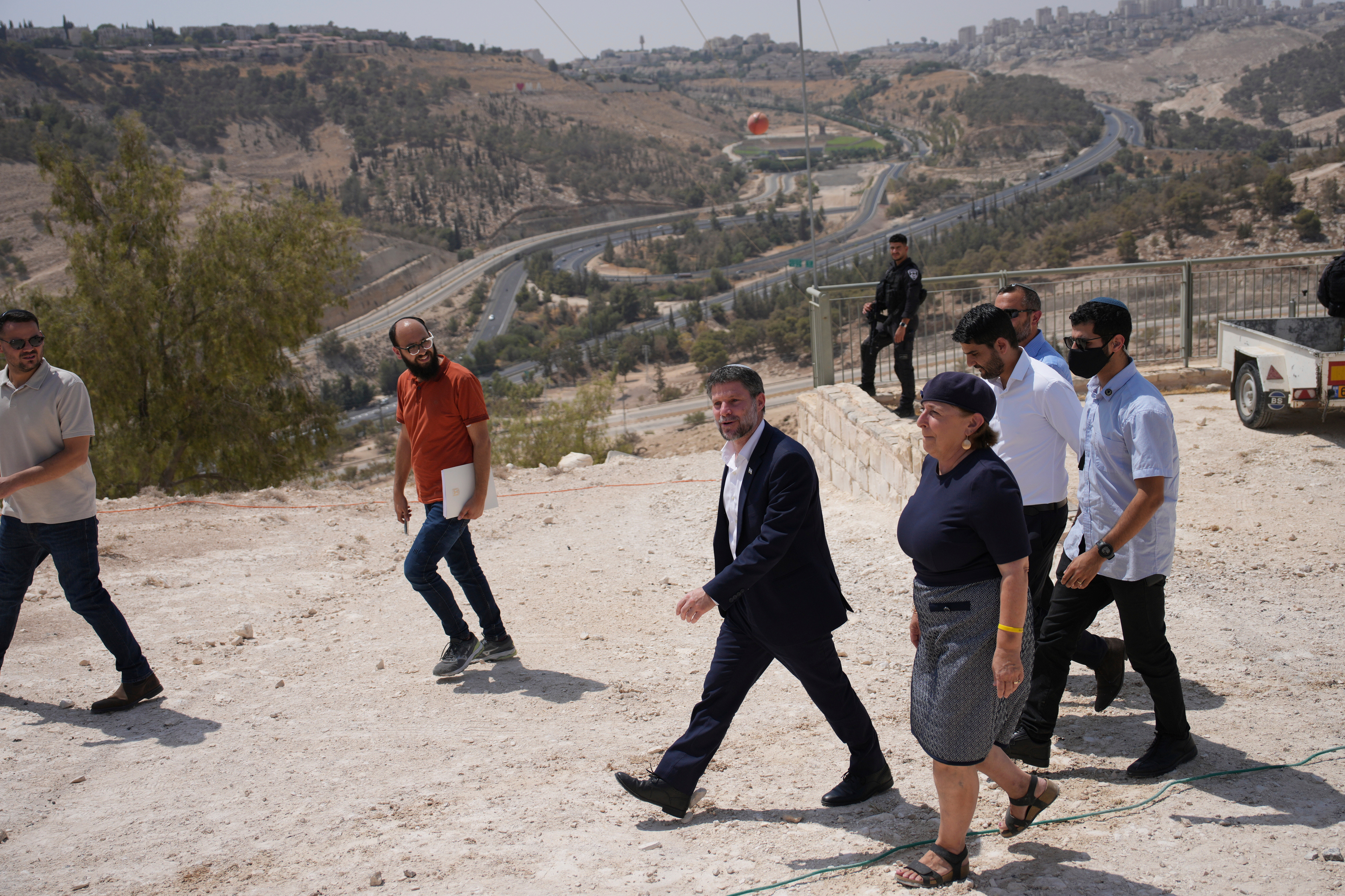 FILE - Israeli Finance Minister Bezalel Smotrich arrives for a news conference about new settlement construction in the Israel-occupied West Bank near Maale Adumim, Aug. 14, 2025. (AP Photo/Ohad Zwigenberg, File)