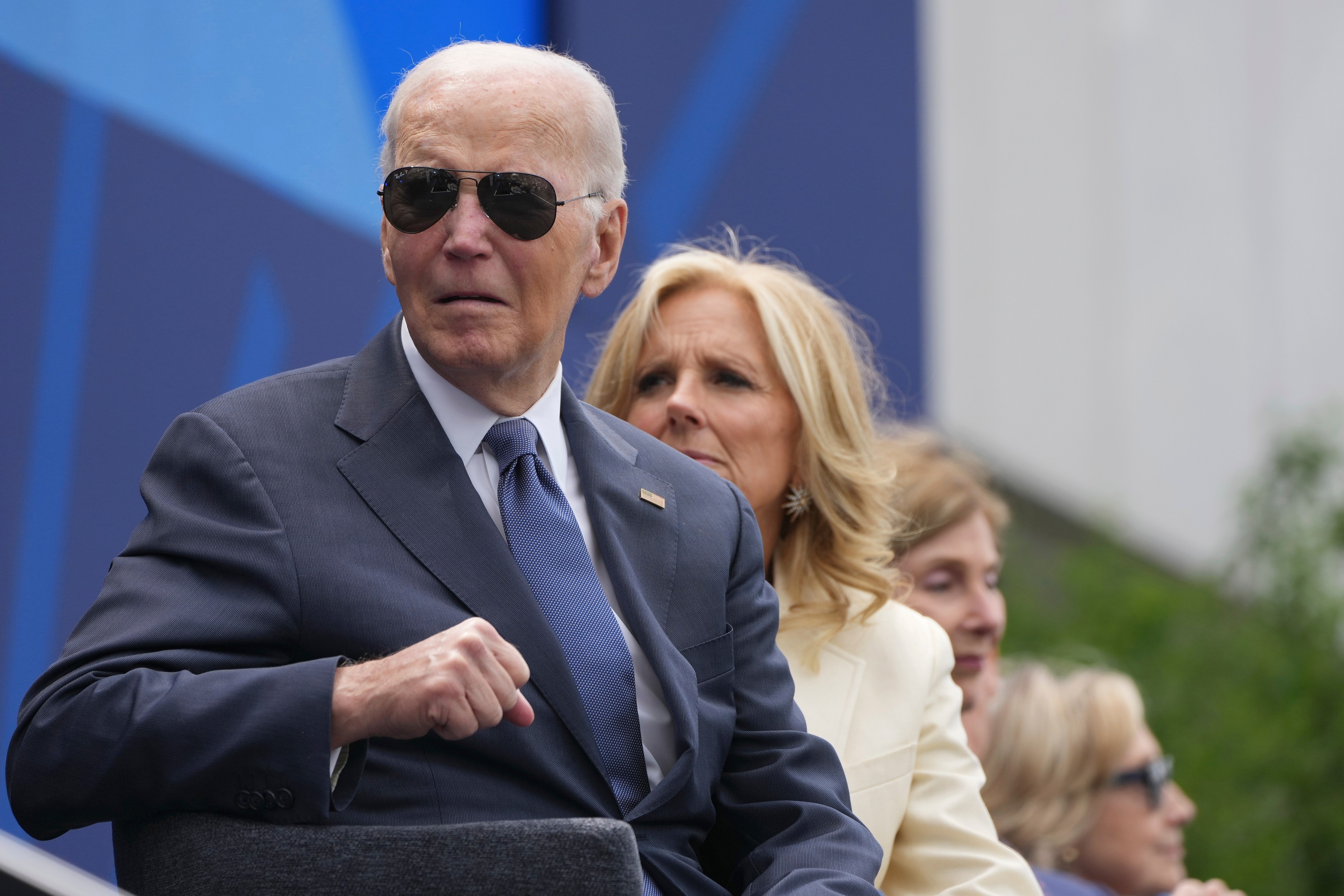 From l-r., former President Joe Biden, former first lady Jill Biden, former first lady Laura Bush and former Secretary of State Hillary Clinton on stage during the dedication ceremony for the Obama Presidential Center, Thursday, June 18, 2026, in Chicago. (AP Photo/Alex Brandon)