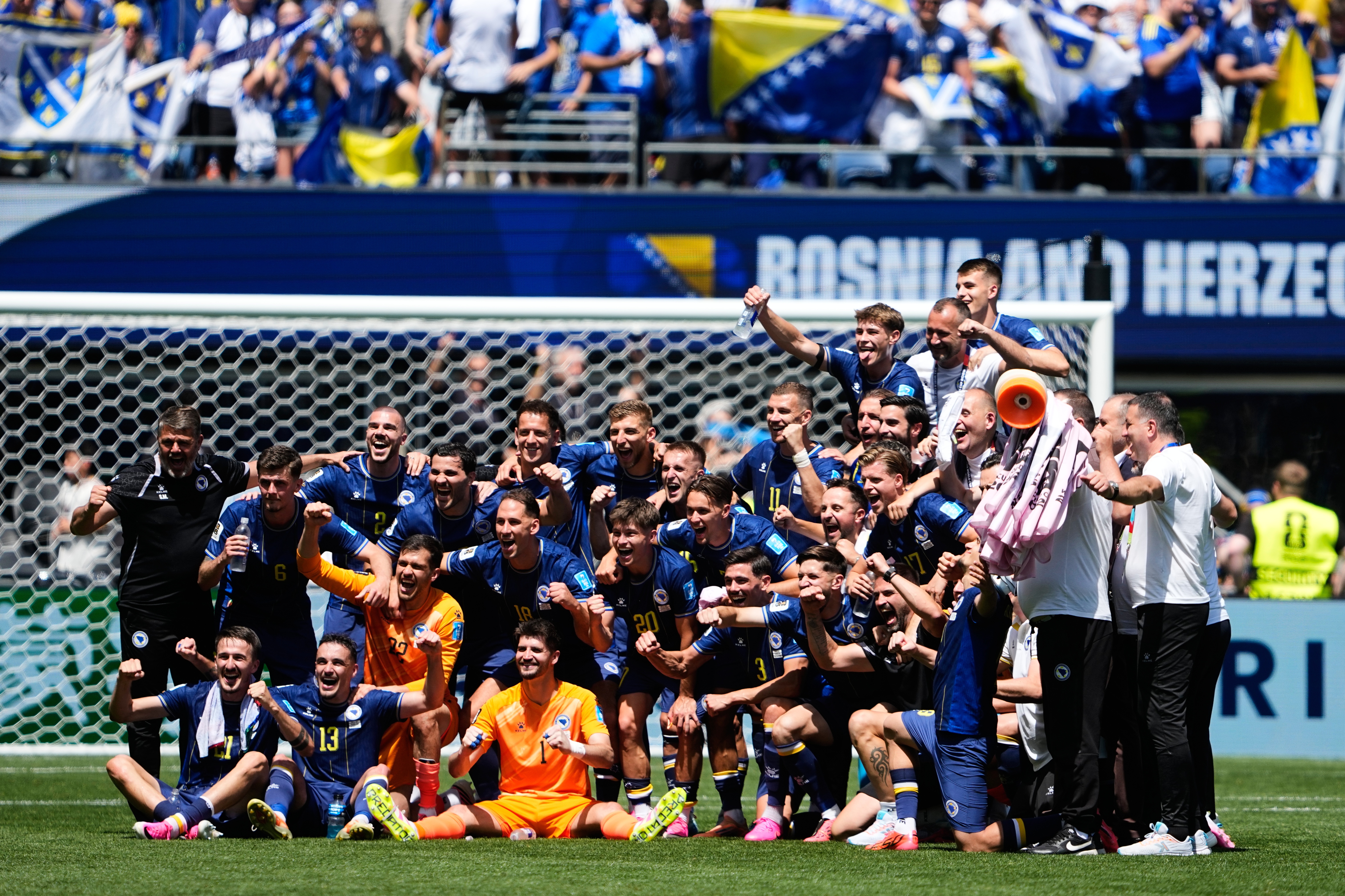 Bosnia players pose for a photo after their victory against Qatar in the World Cup Group B soccer match in Seattle, Wednesday, June 24, 2026. (AP Photo/Lindsey Wasson)