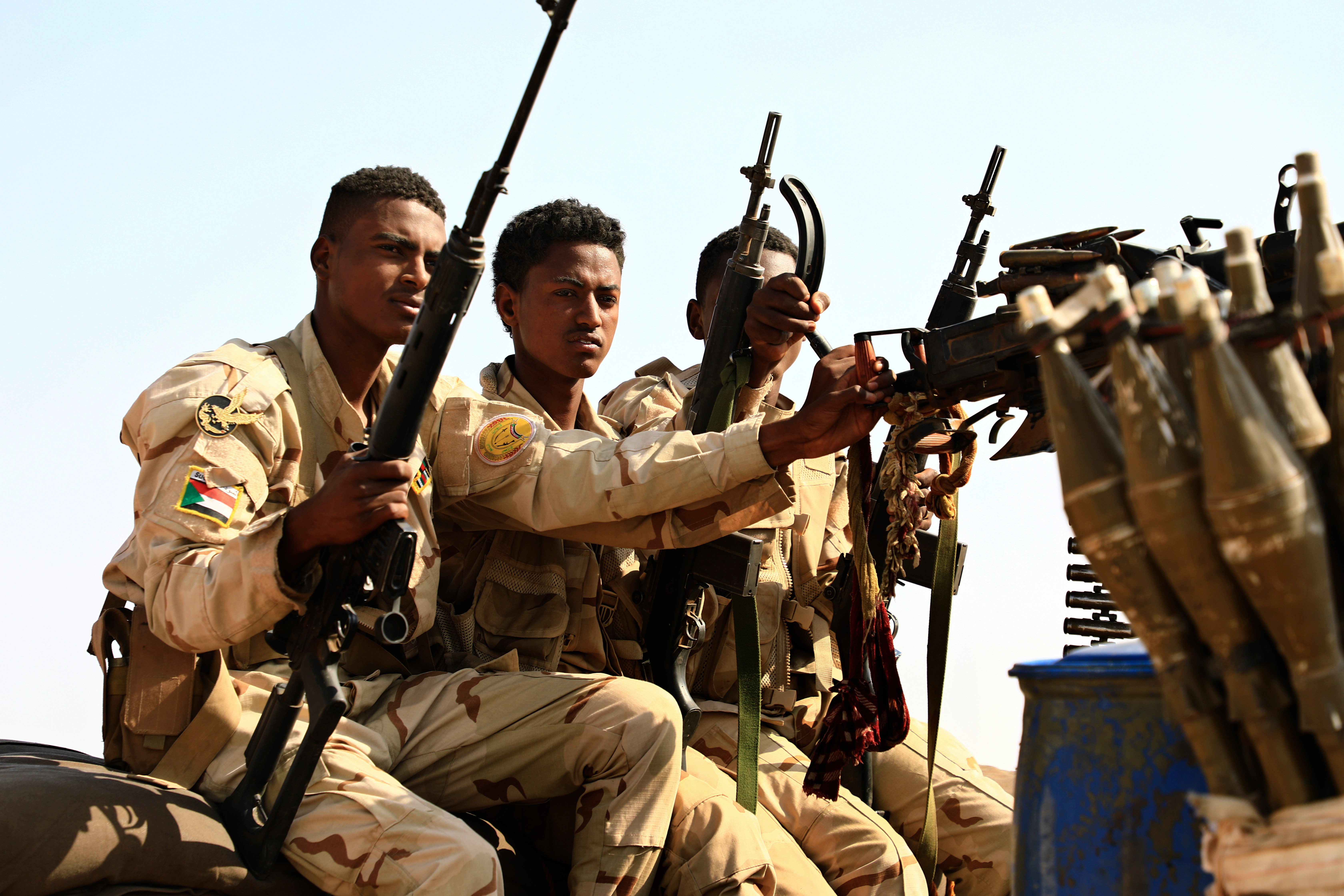 FILE - Sudanese soldiers from the Rapid Support Forces unit patrol during a rally for Gen. Mohammed Hamdan Dagalo, in Garawee town, north of Sudan, on June 15, 2019. (AP Photo, File)