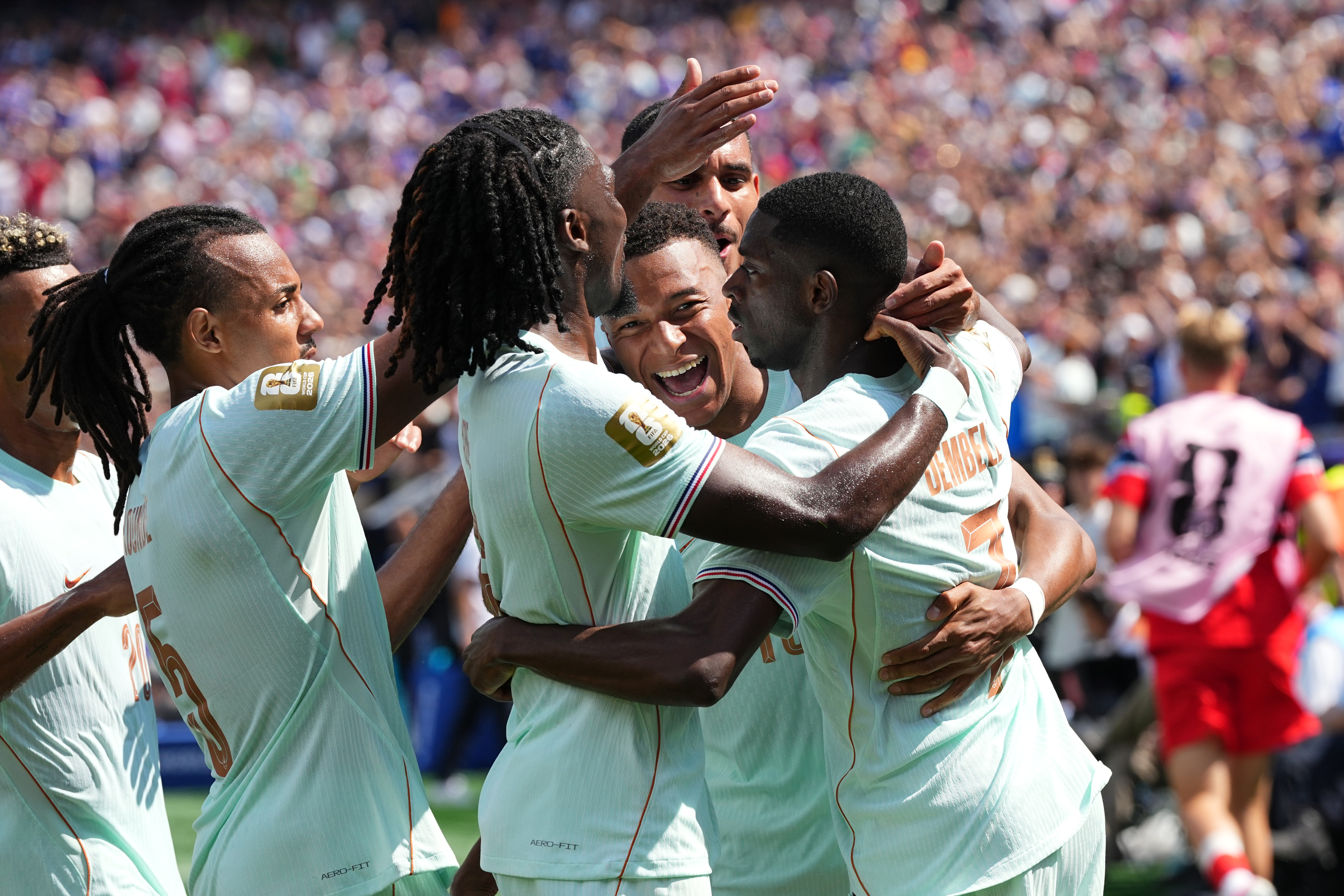 France's Ousmane Dembele, right, celebrates with Kylian Mbappe and other teammates after scoring his side's third goal during the World Cup Group I soccer match between Norway and France in Foxborough, Mass., near Boston, Friday, June 26, 2026. (AP Photo/Martin Meissner)