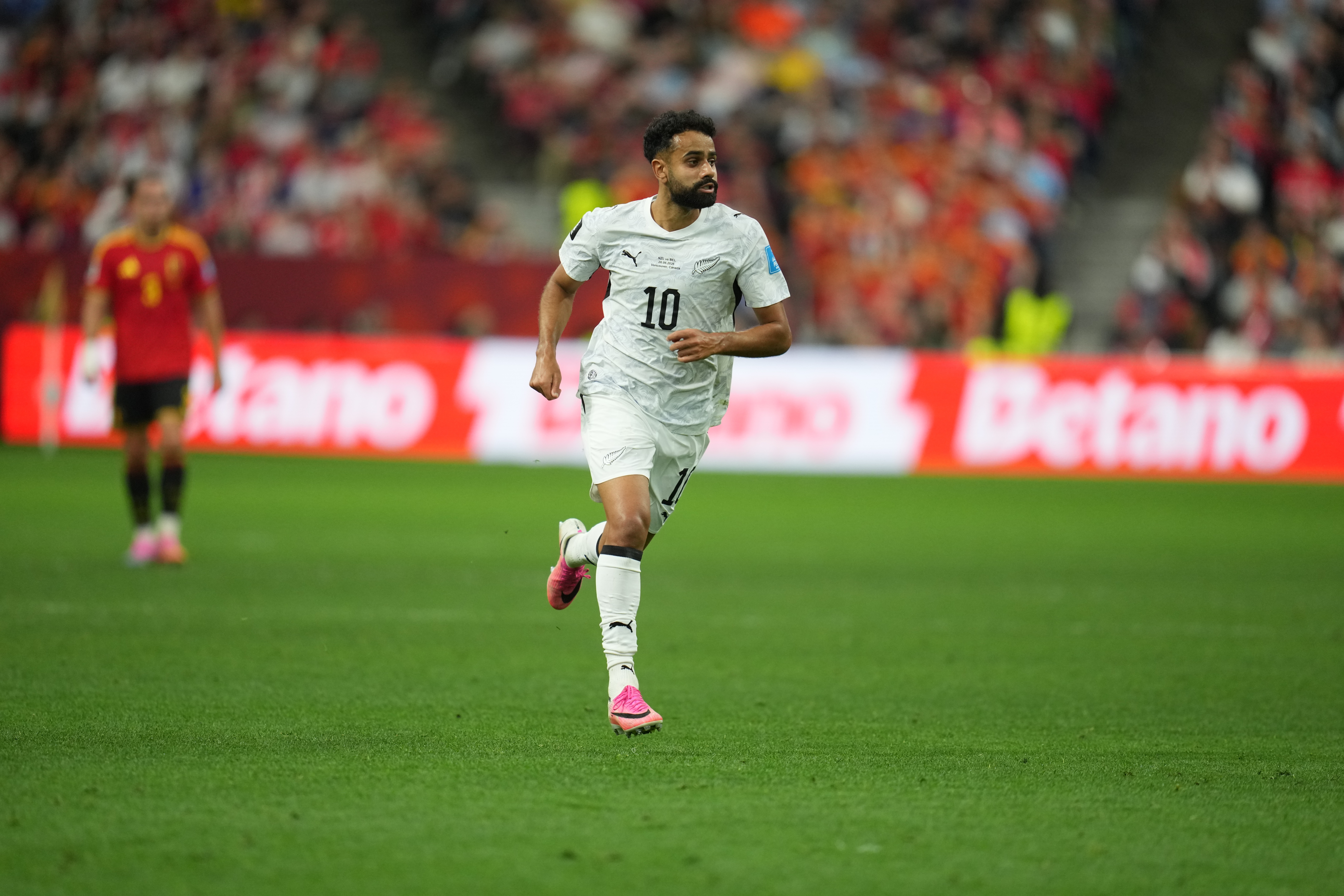 New Zealand's Sarpreet Singh (10) runs during the World Cup Group G soccer match between New Zealand and Belgium in Vancouver, British Columbia, Friday, June 26, 2026. (AP Photo/Abbie Parr)