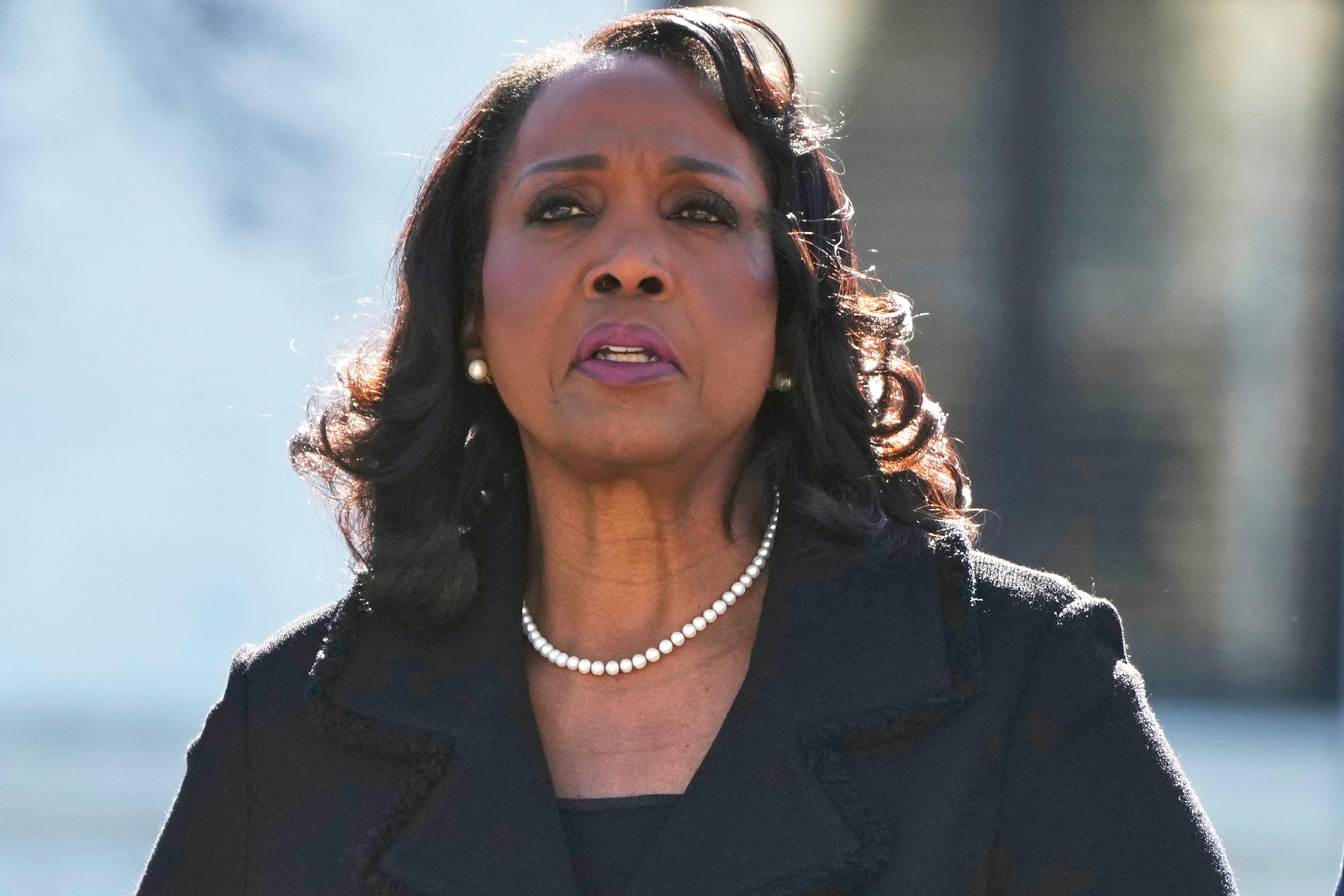 FILE - Federal Reserve Board of Governors member Lisa Cook leaves the Supreme Court in Washington, Jan. 21, 2026. (AP Photo/Mark Schiefelbein, File)