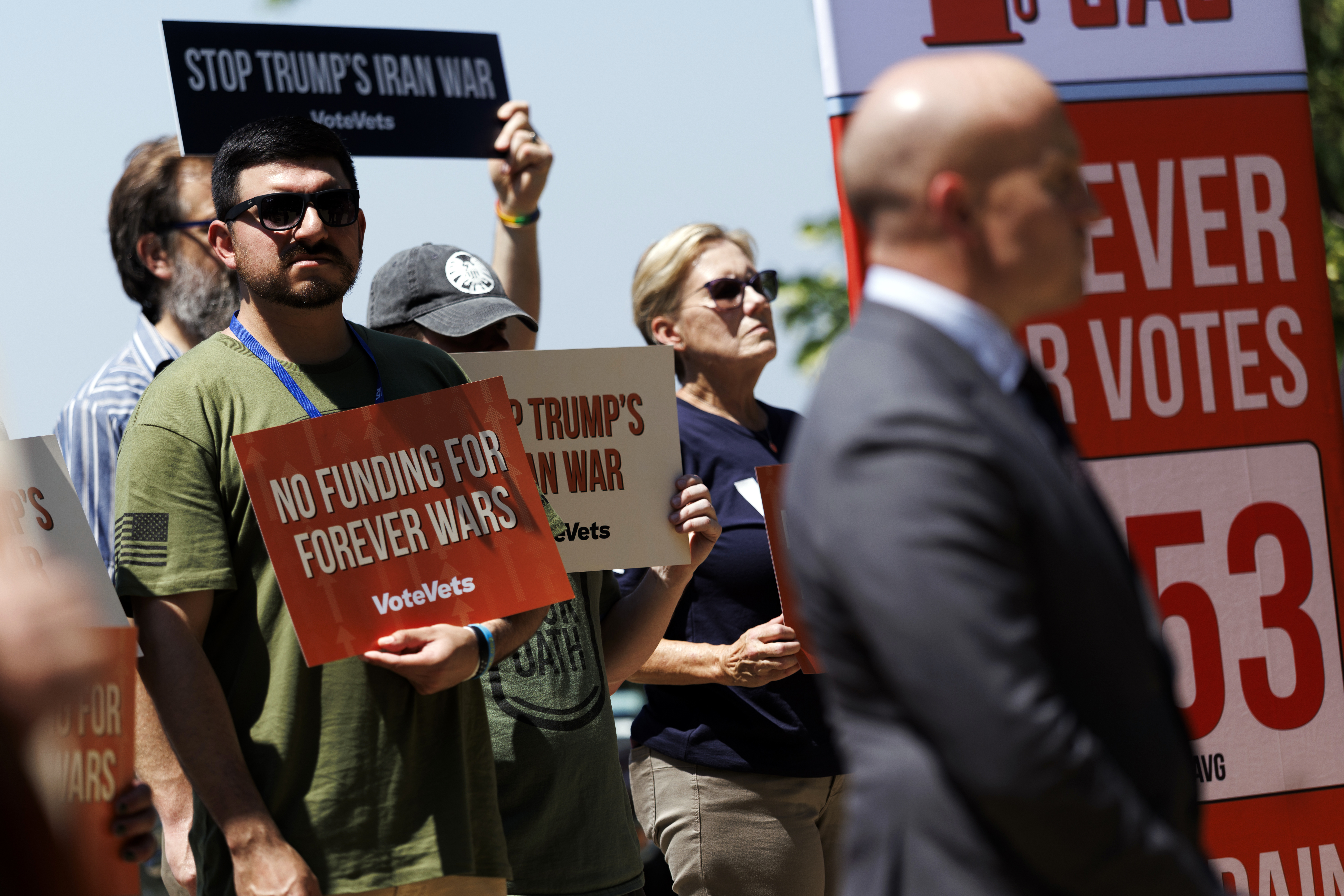 epa12978802 Protesters during a rally against the Iran conflict outside the US Capitol, Washington, DC, USA, 20 May 2026. The US Senate advanced a bill on 19 May that would force US President Donald Trump to either gain congressional approval or withdraw US troops. Senate Democrats argue the Iran war has caused an increase in gasoline prices across the United States. EPA/WILL OLIVER