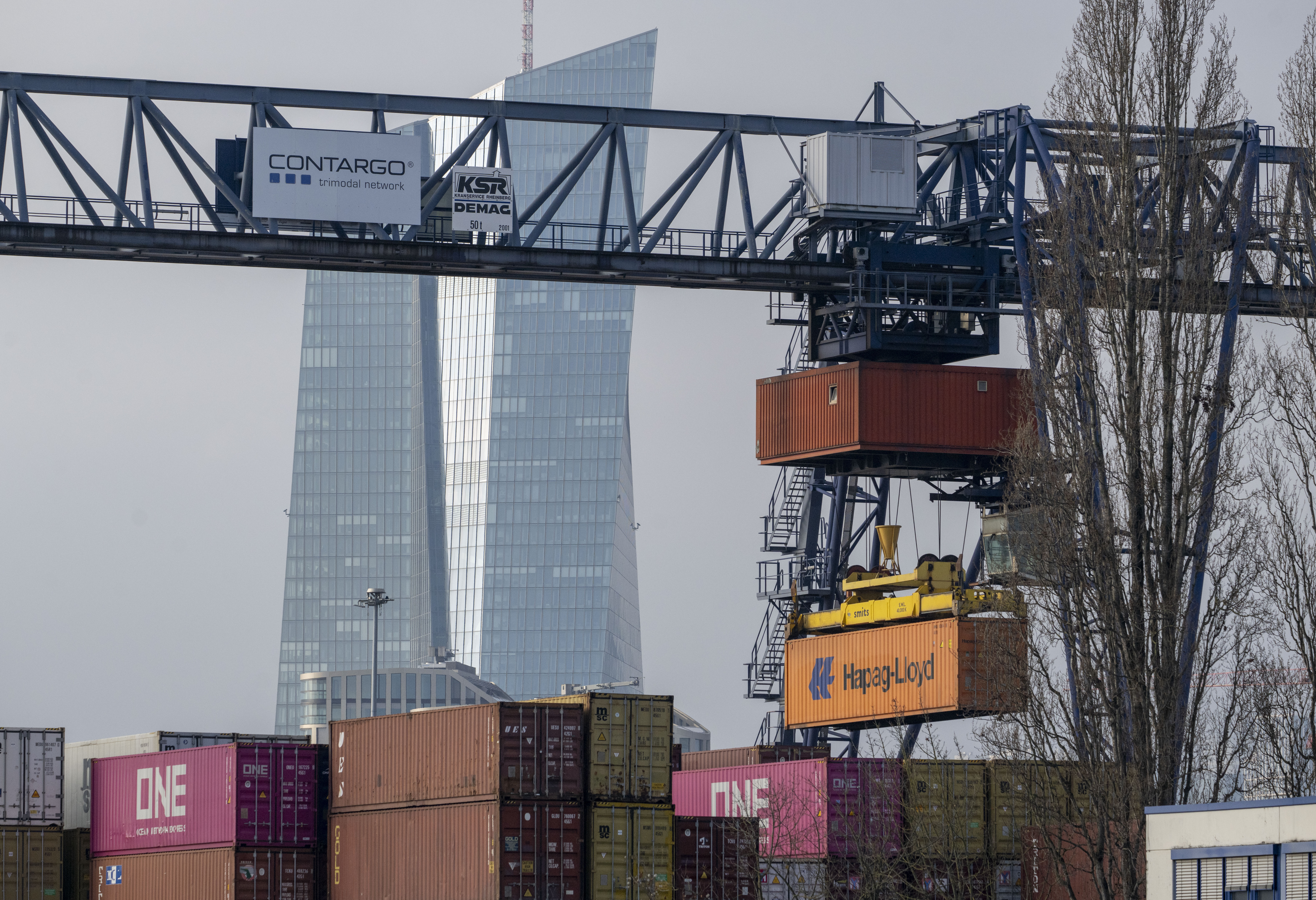 FRANKFURT AM MAIN, GERMANY - JANUARY 19: The headquarters of the European Central Bank (ECB) is seen behind shipping containers of the Frankfurt container port on January 19, 2026 in Frankfurt, Germany. European leaders are scheduled to meet later this week to coordinate their response to the latest tariffs threat from U.S. Donald Trump. Trump recently announced he will impose punitive tariffs on European countries he sees as obstructing his desire to acquire Greenland. (Photo by Thomas Lohnes/Getty Images)
