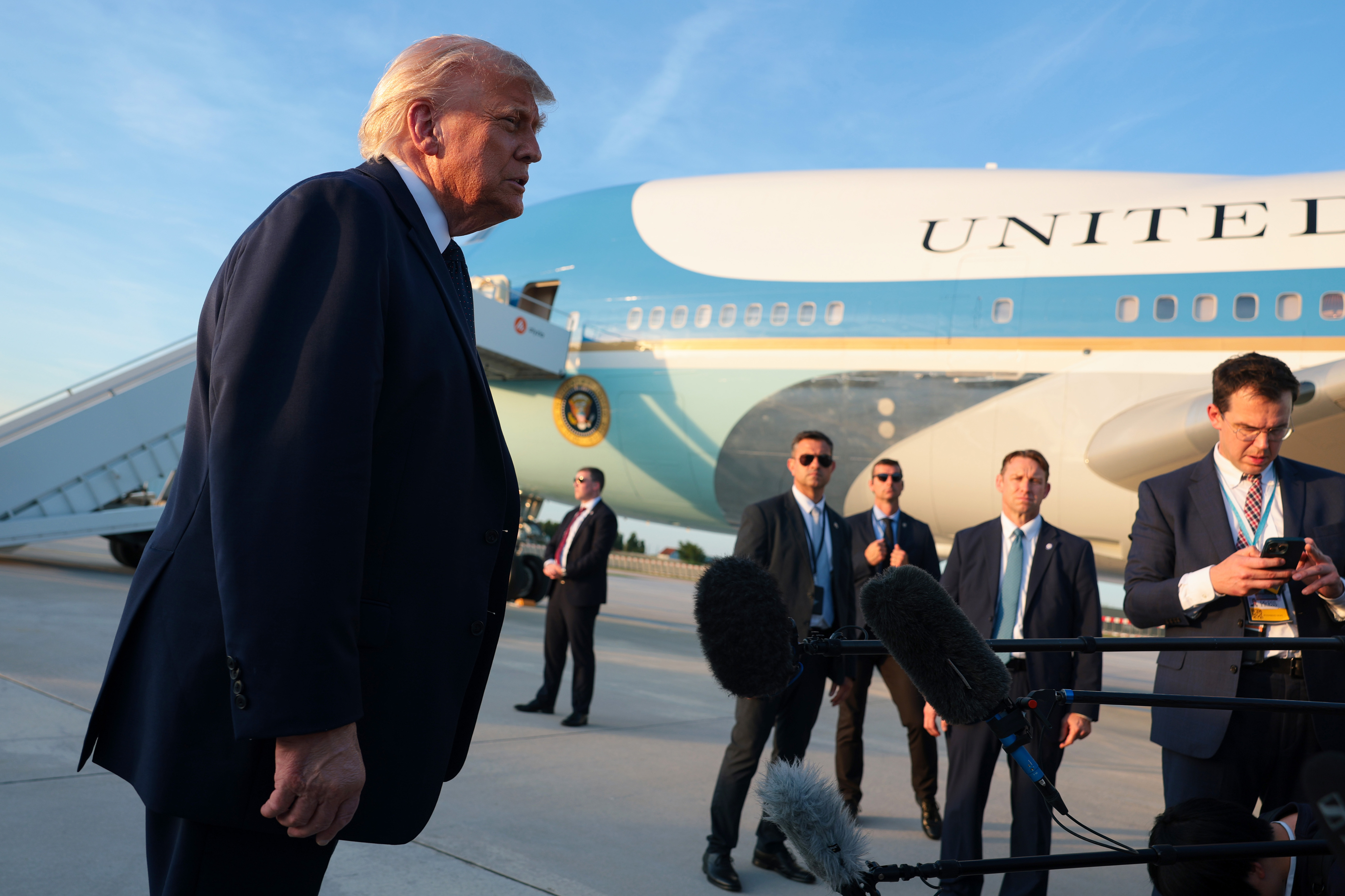 ORLY, FRANCE - JUNE 17: U.S. President Donald Trump speaks to reporters as he arrives at Orly Airport to attend a dinner with French President Emmanuel Macron at Chateau de Versailles on June 17, 2026 in Orly, France. The dinner followed the conclusion of this week's Group of 7 (G7) summit in Evian, France. (Photo by Anna Moneymaker/Getty Images)