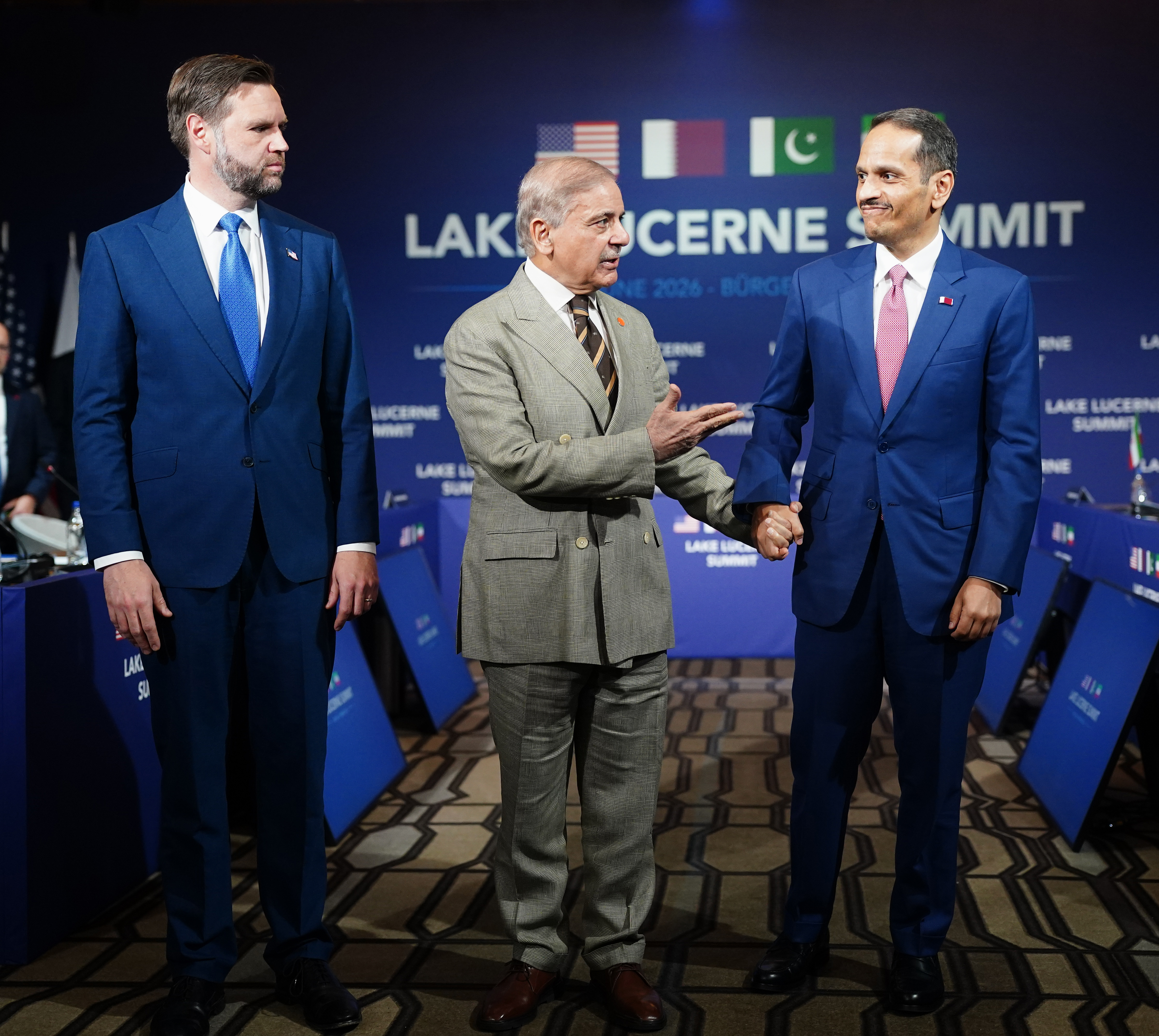 STANSSTAD, SWITZERLAND - JUNE 21: (EDITOR'S NOTE: Alternate crop) U.S. Vice President JD Vance looks on as Pakistan's Prime Minister Shehbaz Sharif speaks while gesturing towards Qatar's Prime Minister and Minister for Foreign Affairs Sheikh Mohammed bin Abdulrahman bin Jassim Al-Thani at the start of a quadrilateral meeting between the U.S., Iran, Pakistan, and Qatar at the Lake Lucerne Summit, aimed at advancing a deal to end the Middle East conflict at the Buergenstock Resort, Lake Lucerne on June 21, 2026 near Stansstad, Switzerland. Vance is visiting Switzerland for negotiations with Iran to end the war and open the Strait of Hormuz that have been delayed by Israeli strikes in Lebanon. (Photo by Nathan Howard-Pool/Getty Images)