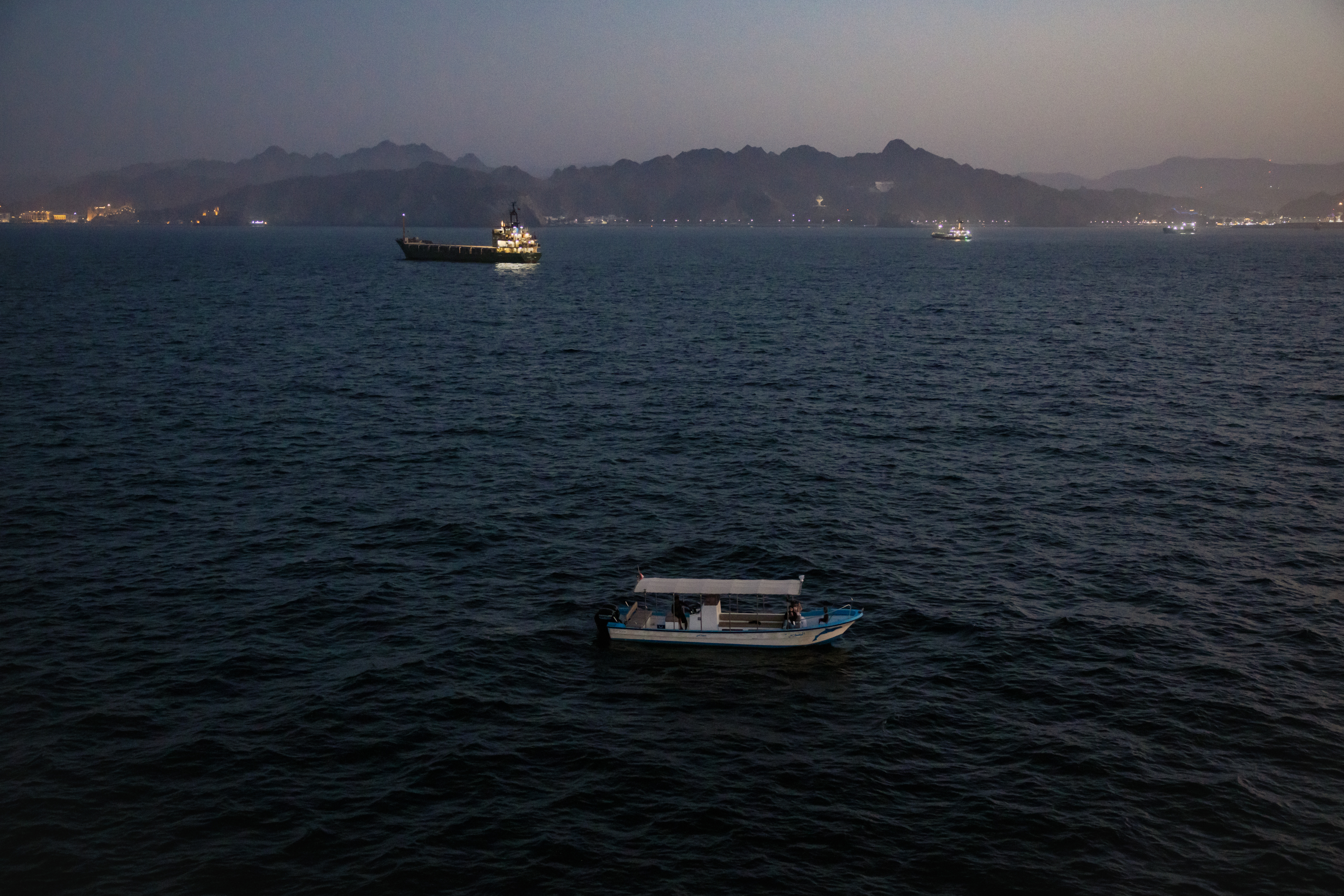 MUSCAT, OMAN - JUNE 23: Oil tankers and cargo vessels are anchored off the coast of Oman after being stranded for days as congestion at Port Sultan Qaboos has prevented them from docking on June 23, 2026 in Muscat, Oman. The Strait of Hormuz, a vital shipping route for the region's oil and gas, was effectively blockaded since the outbreak of war between the United States and Iran in late February. This week's provisional peace deal between the countries was meant to reopen the waterway to shipping traffic, but the pace of that reopening is unclear amid continued fighting in Lebanon and the need to clear the Strait of sea mines. On Sunday, U.S. Vice President JD Vance arrived in Switzerland for high-level talks with the Iranian delegation, as the two sides seek to clarify the terms of ending the war. (Photo by Elke Scholiers/Getty Images)