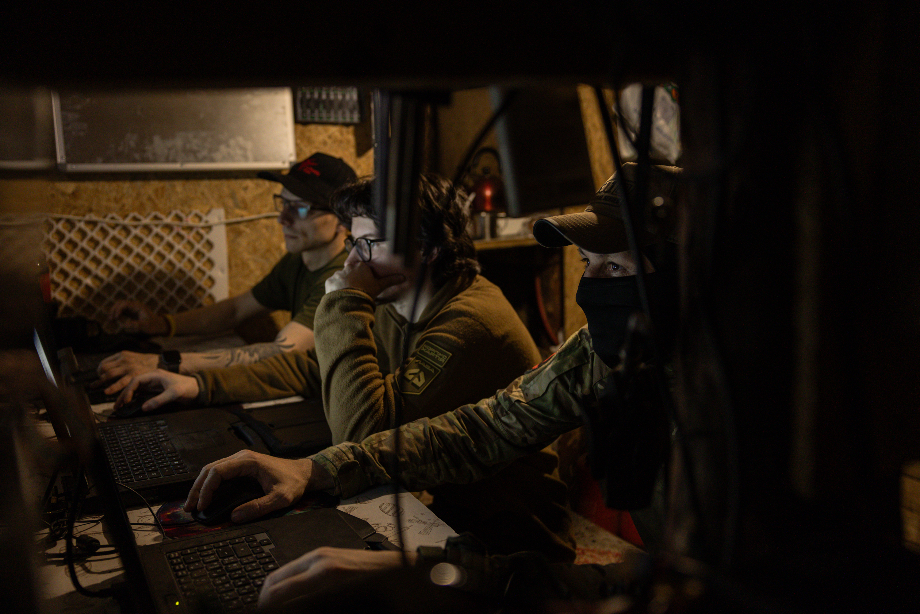 KHARKIV REGION, UKRAINE - MAY 22: (EDITOR'S NOTE: Image has been reviewed by Ukrainian military officials prior to transmission) Members of the Lava Unmanned Systems Regiment monitor screens as they wait for a combat mission on May 22, 2026 in Kharkiv region, Ukraine. The Lava Unmanned Systems Regiment, part of the 2nd Khartiia Corps of the Ukrainian National Guard, is a specialized unit focused on combat operations using drones and robotic systems, including deep reconnaissance and precision strikes behind enemy lines. Originally formed as a battalion in 2025, the unit was expanded into a regiment in 2026 as Ukraine increasingly relies on unmanned technologies in warfare. (Photo by Diego Fedele/Getty Images)