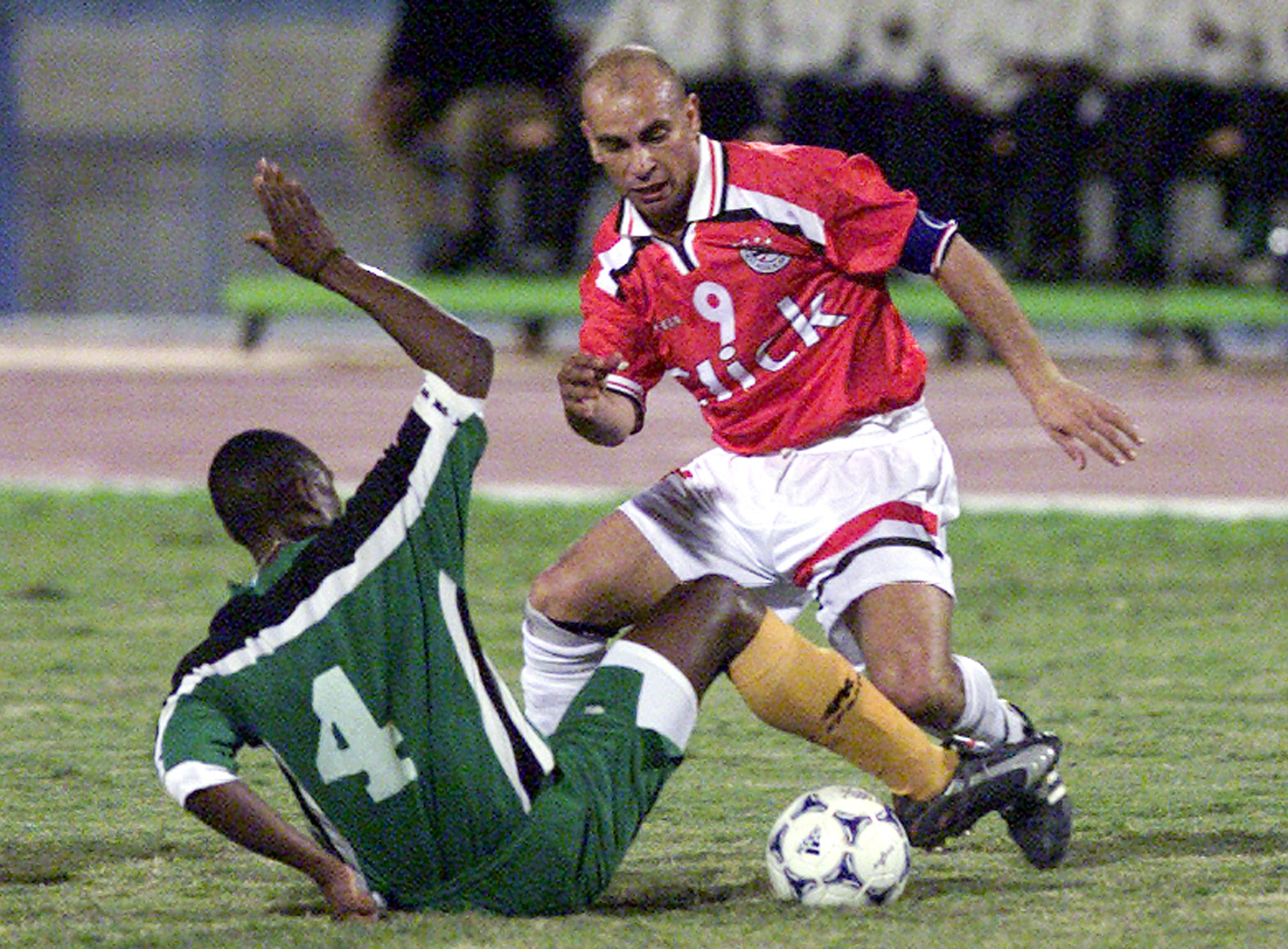 Hossam Hassan, now the Egyptian coach, seen here manoeuvring the ball during a friendly international match against Zambia in Cairo January 9, 2001 [Reuters]