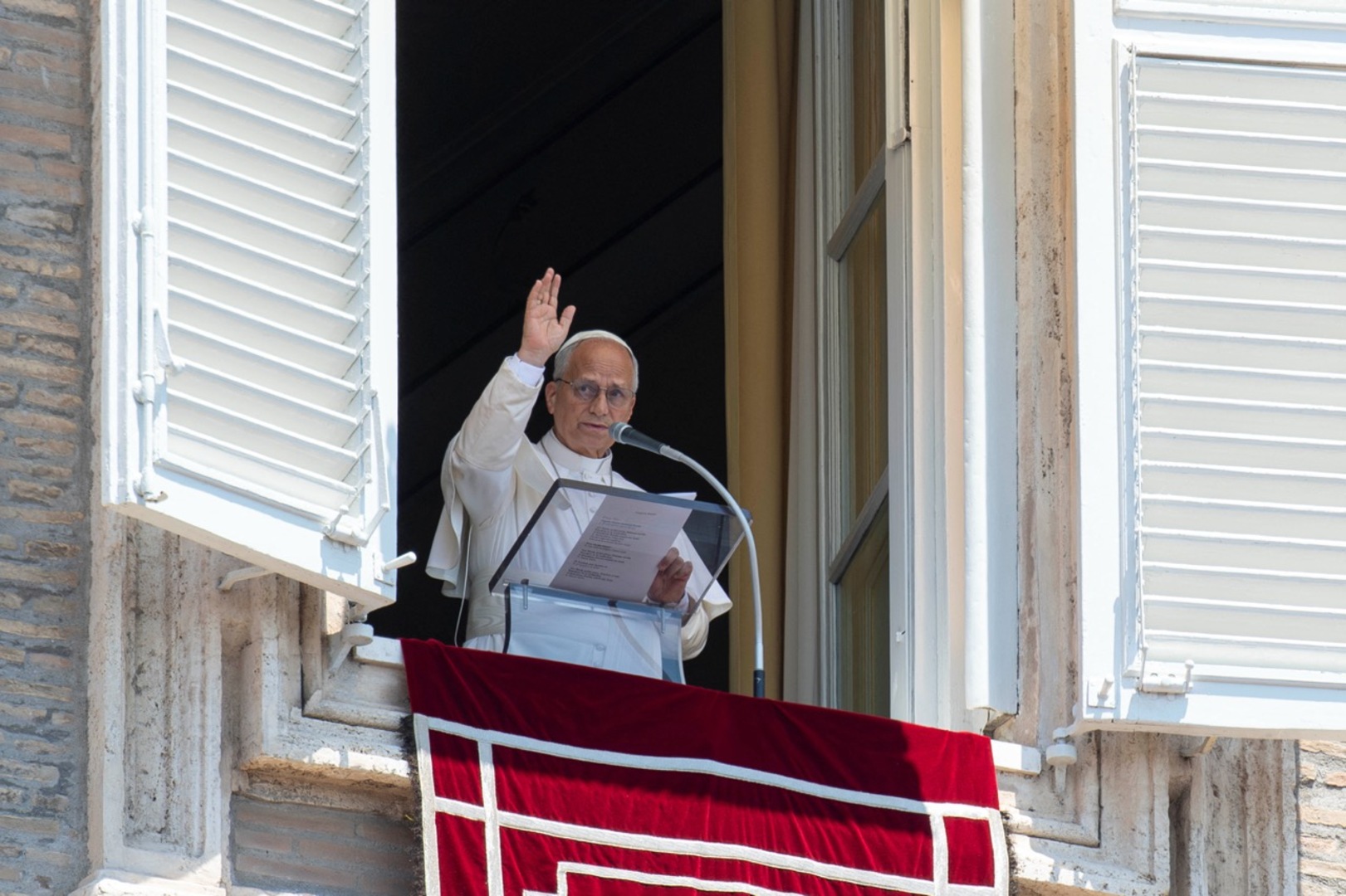 Pope Leo leads the Angelus prayer from a window of the Apostolic Palace at the Vatican, June 28, 2026. [Vatican Media/&shy;Matteo Pernaselci/Handout via REUTERS]