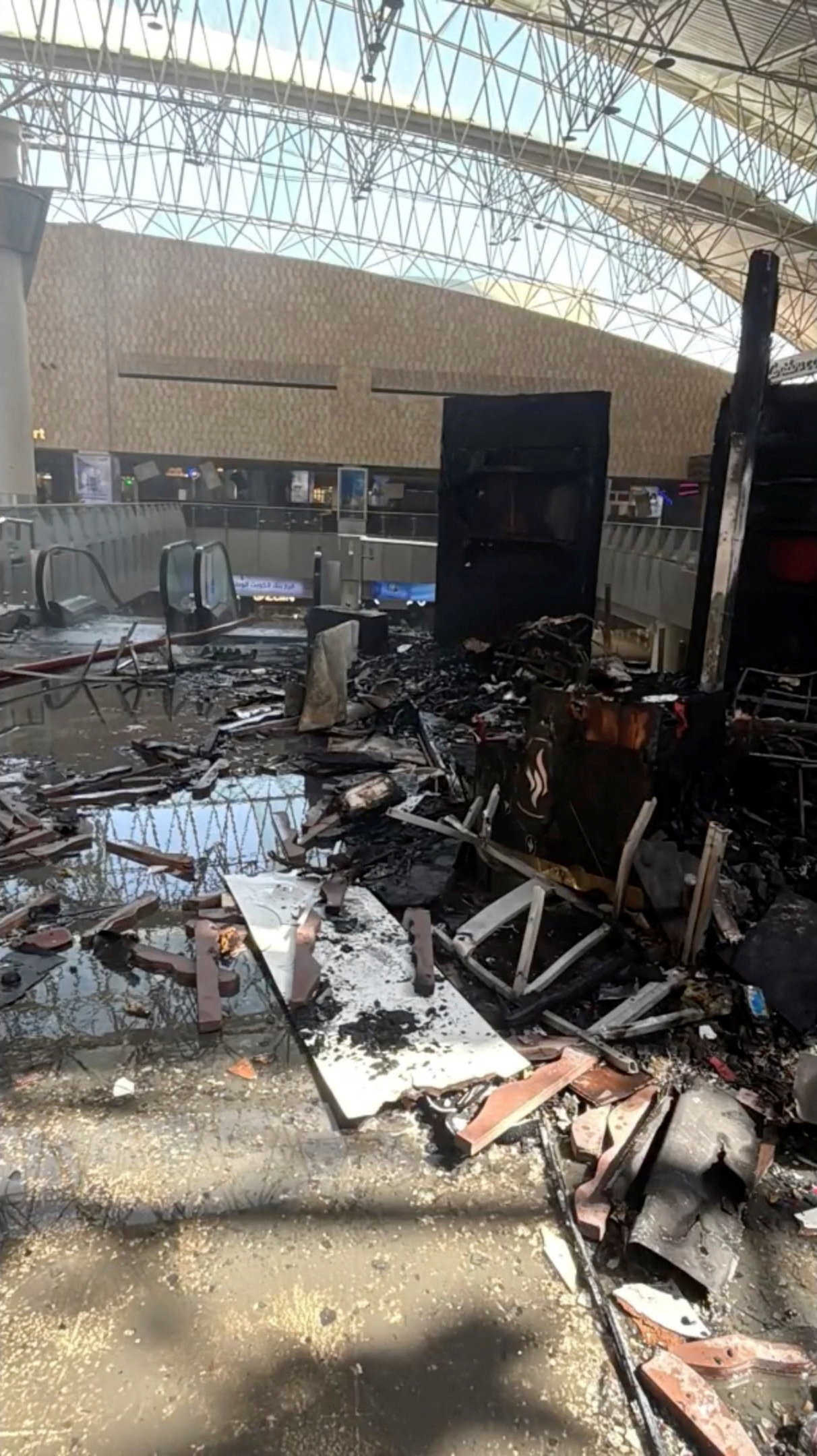 Debris lies on the floor after an attack on Kuwait International Airport on June 3, 2026 [Reuters]