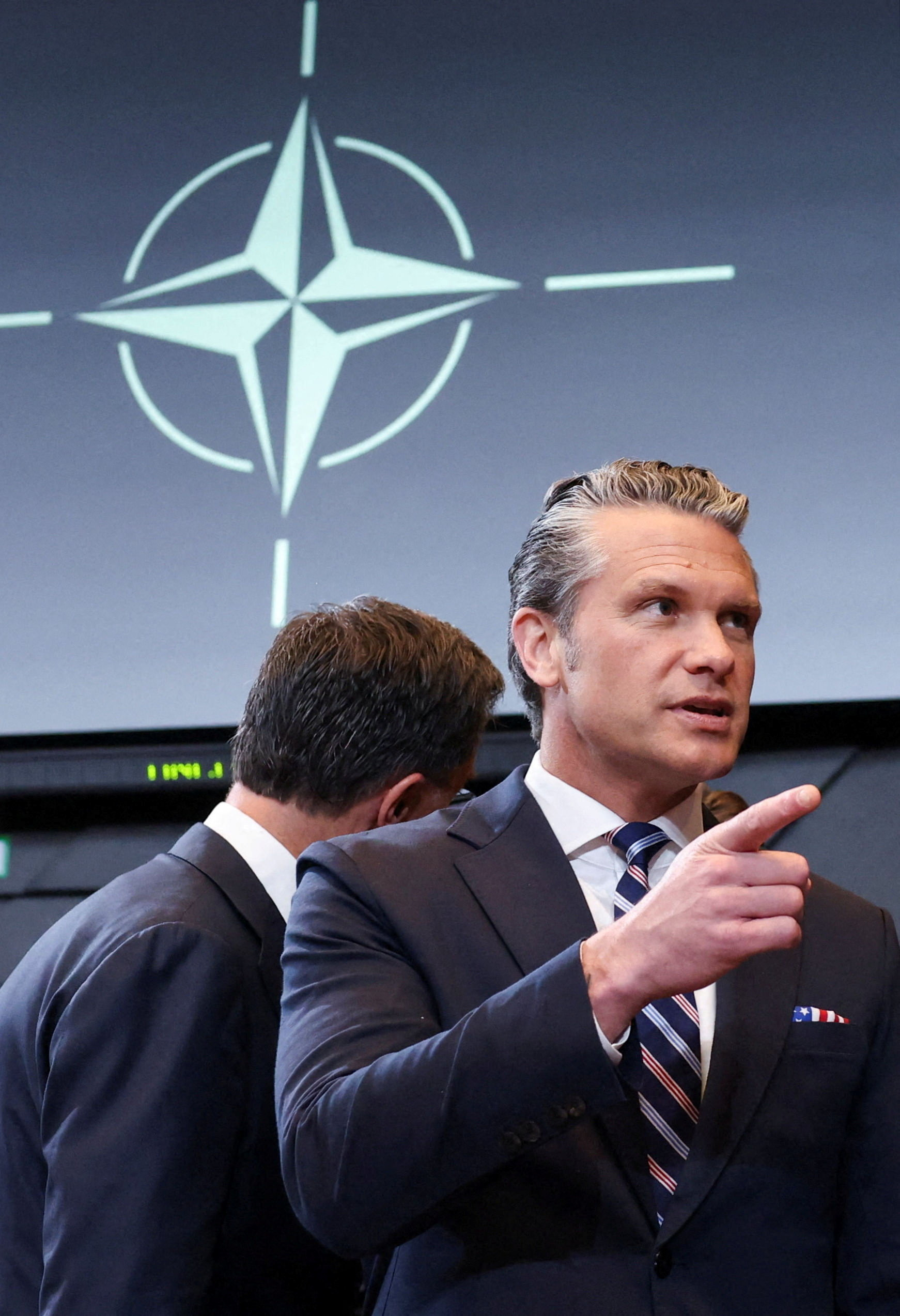 U.S. Secretary of Defense Pete Hegseth interacts during a meeting of the North Atlantic Council (NAC) during the NATO Defence Ministers' meeting at the alliance's headquarters in Brussels, Belgium, June 18, 2026. REUTERS/Stoyan Nenov