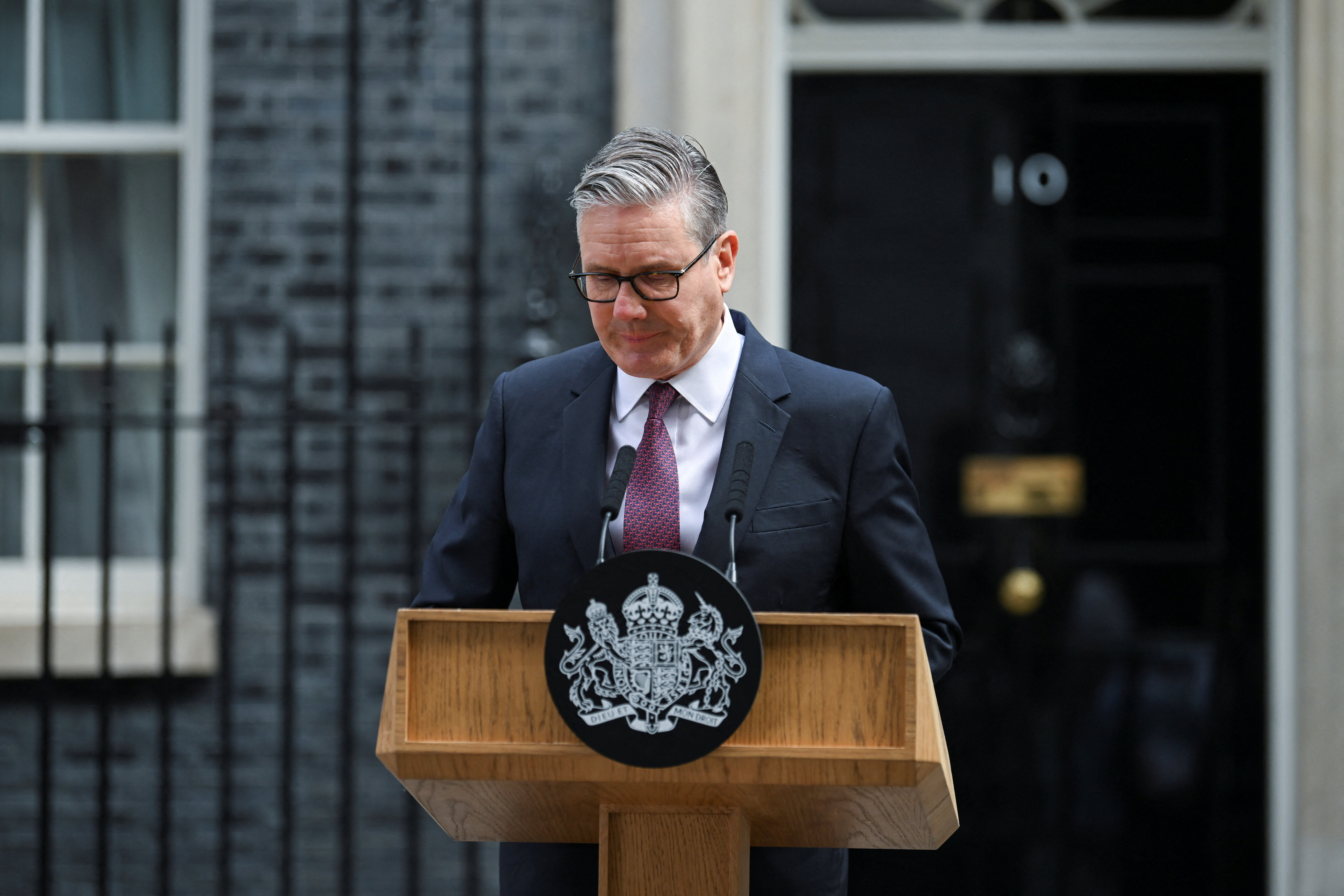 British Prime Minister Keir Starmer reacts as he announces the timeline for his resignation, outside 10 Downing Street, in London, Britain, June 22, 2026. REUTERS/Jaimi Joy