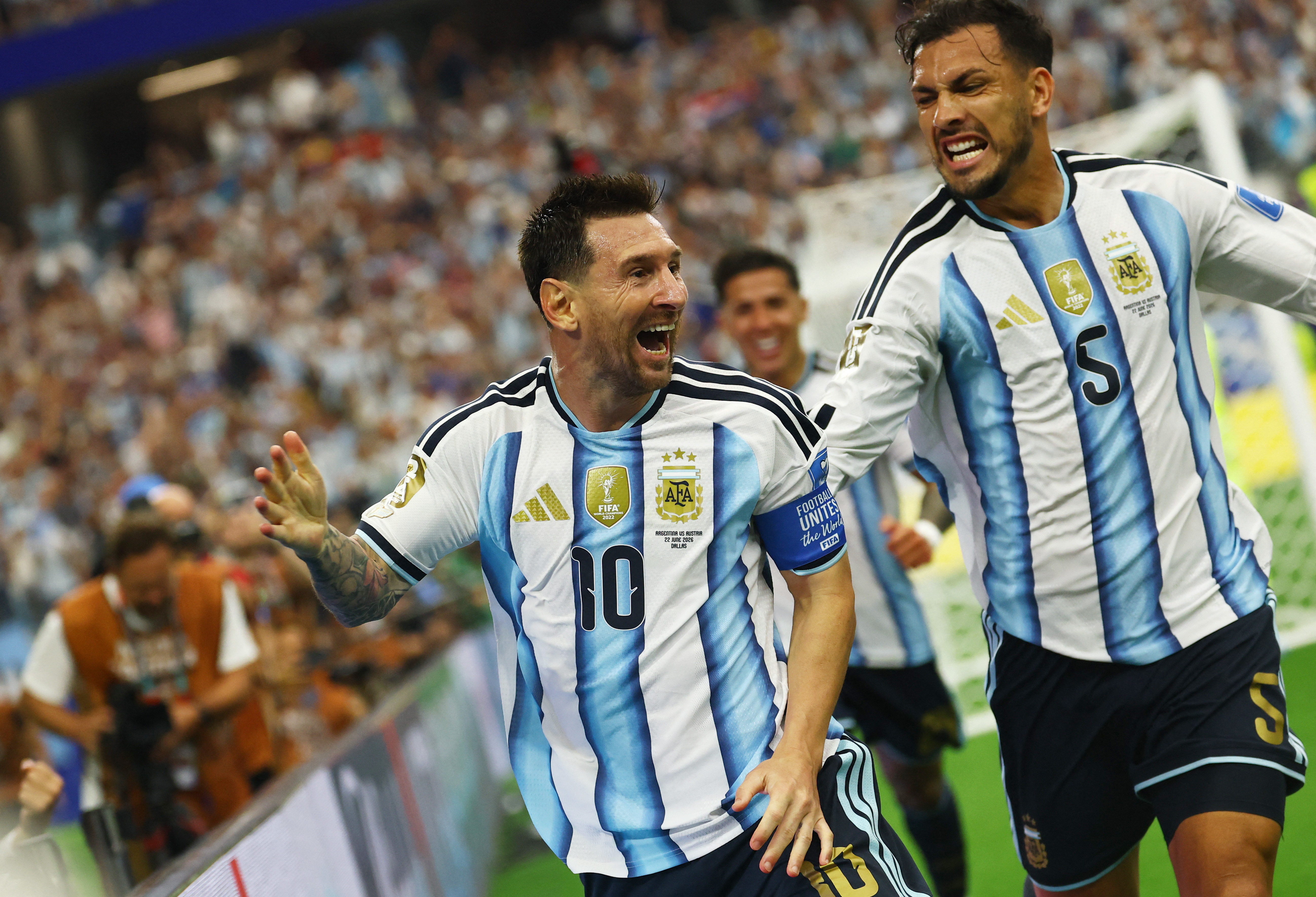 Soccer Football - FIFA World Cup 2026 - Group J - Argentina v Austria - Dallas Stadium, Arlington, Texas, U.S. - June 22, 2026 Argentina's Lionel Messi celebrates scoring their second goal with Leandro Paredes REUTERS/Kai Pfaffenbach