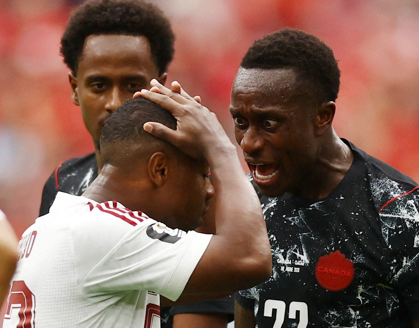 Soccer Football - FIFA World Cup 2026 - Group B - Canada v Qatar - BC Place, Vancouver, Canada - June 18, 2026 Canada's Richie Laryea shouts at Qatar's Assim Madibo after his challenge that injured Canada's Ismael Kone REUTERS/Lee Smith TPX IMAGES OF THE DAY
