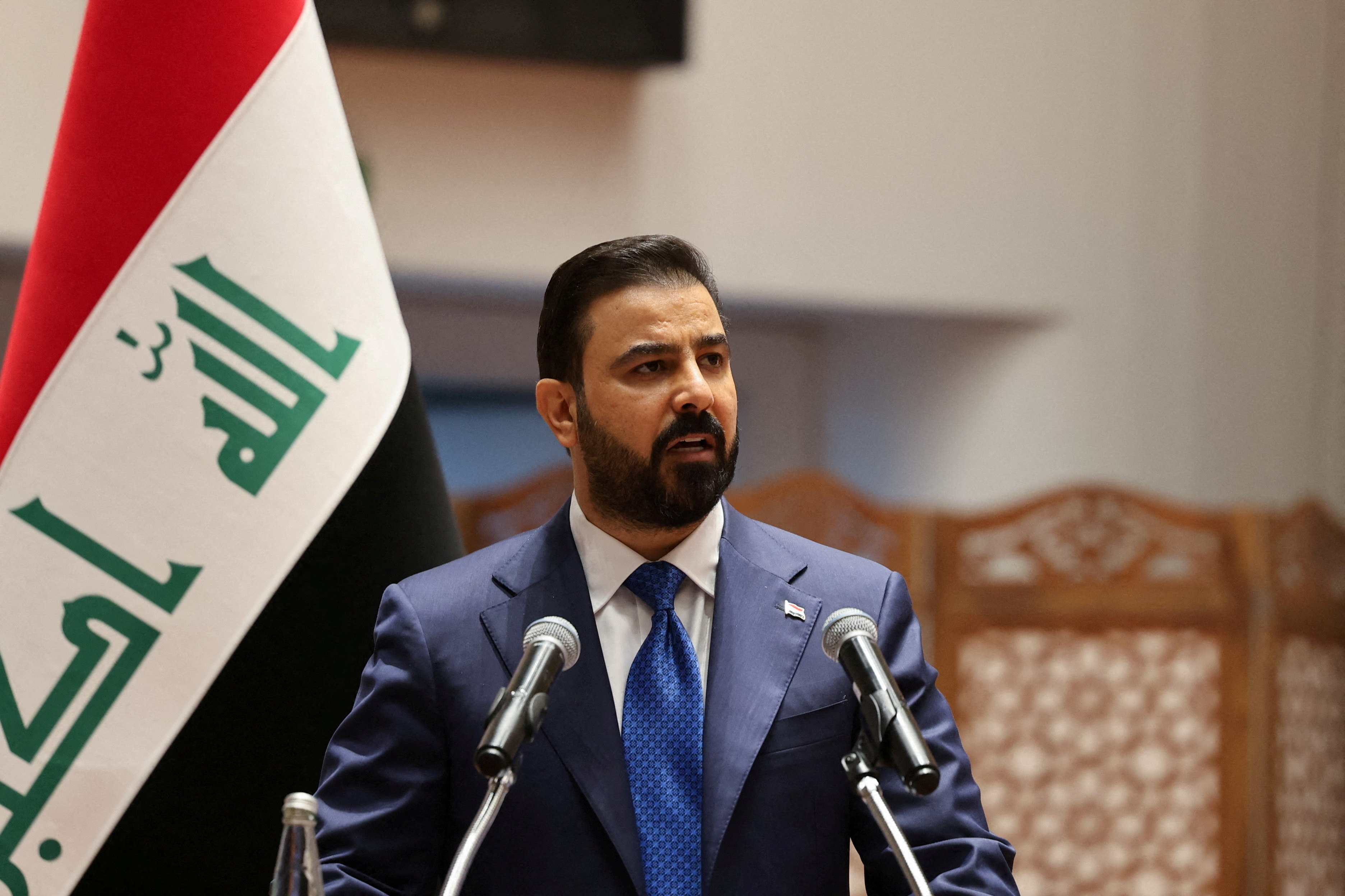 FILE PHOTO: Iraqi Prime Minister-designate Ali al-Zaidi speaks during a parliamentary session to vote in a new government headed by Ali al-Zaidi as prime minister, at the parliament headquarters in Baghdad, Iraq, May 14, 2026. REUTERS/Ahmed Saad/File Photo