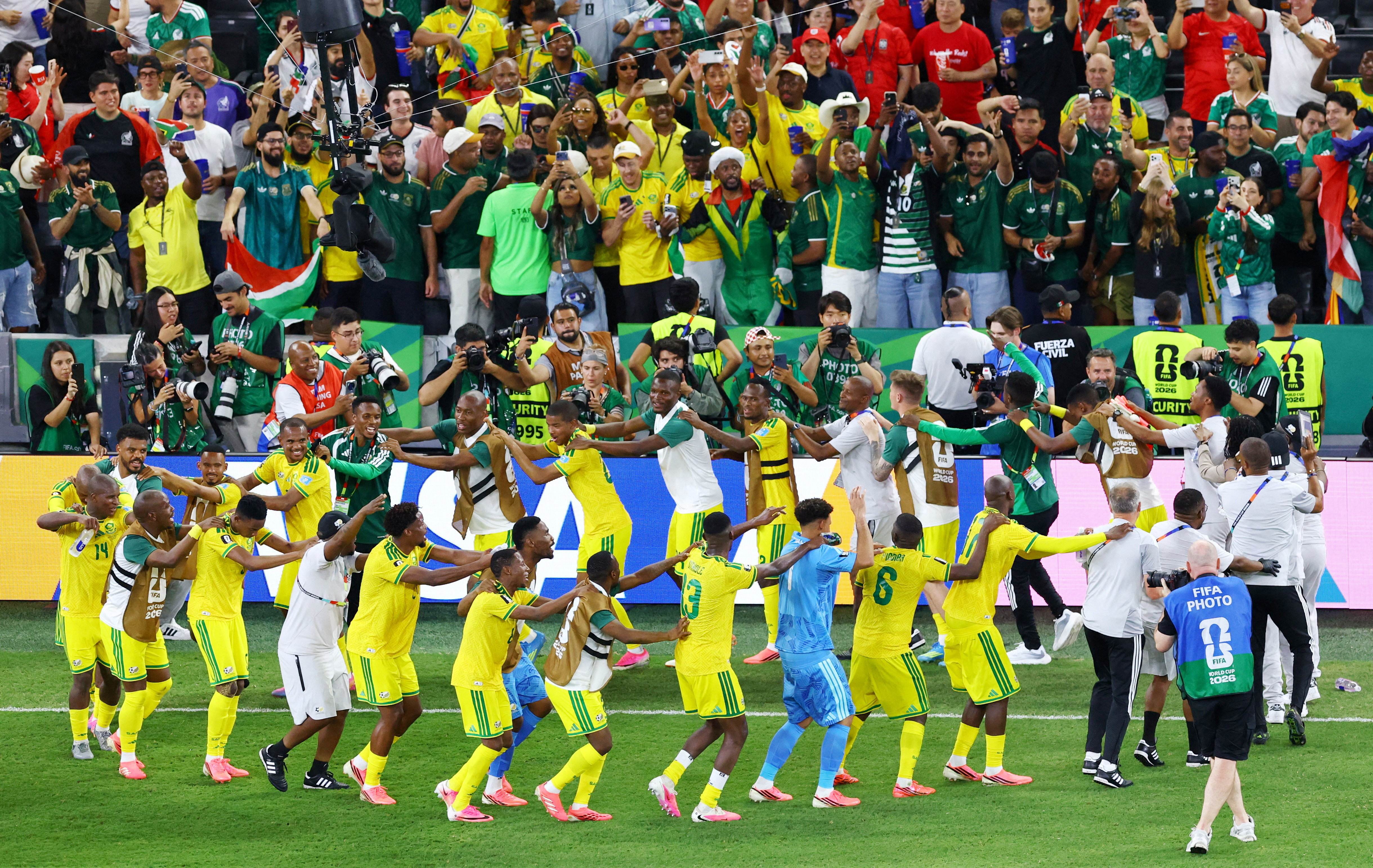 Soccer Football - FIFA World Cup 2026 - Group A - South Africa v South Korea - Estadio Monterrey, Monterrey, Mexico - June 24, 2026 South Africa players celebrate after the match REUTERS/Raquel Cunha TPX IMAGES OF THE DAY
