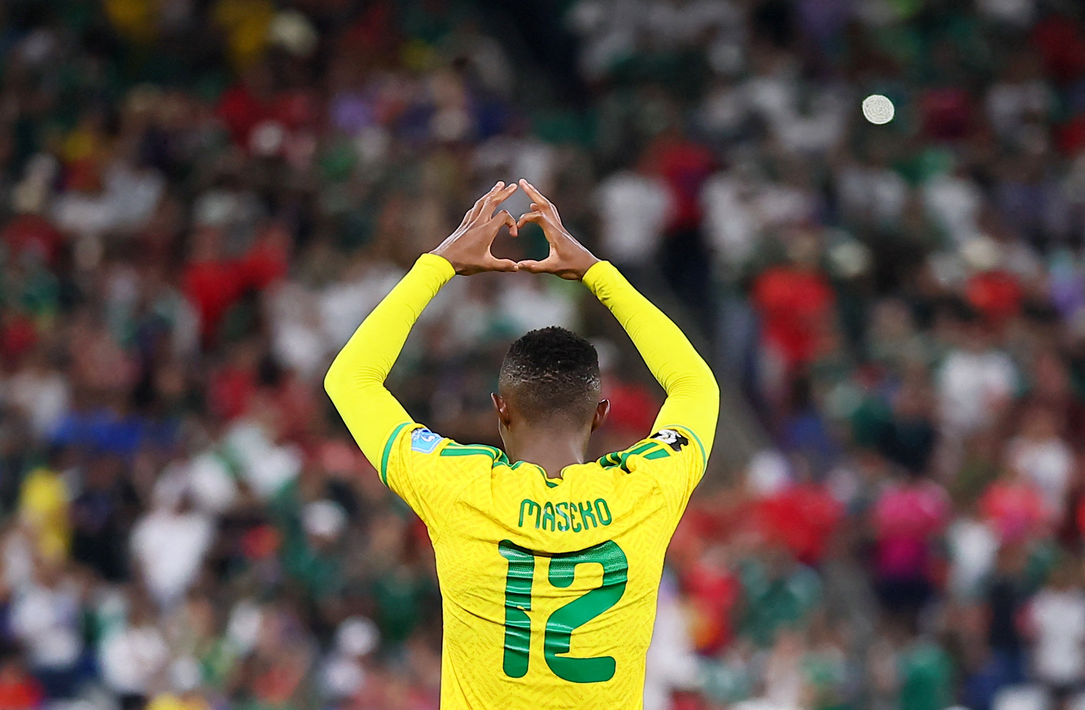 South Africa's Thapelo Maseko celebrates scoring their first goal