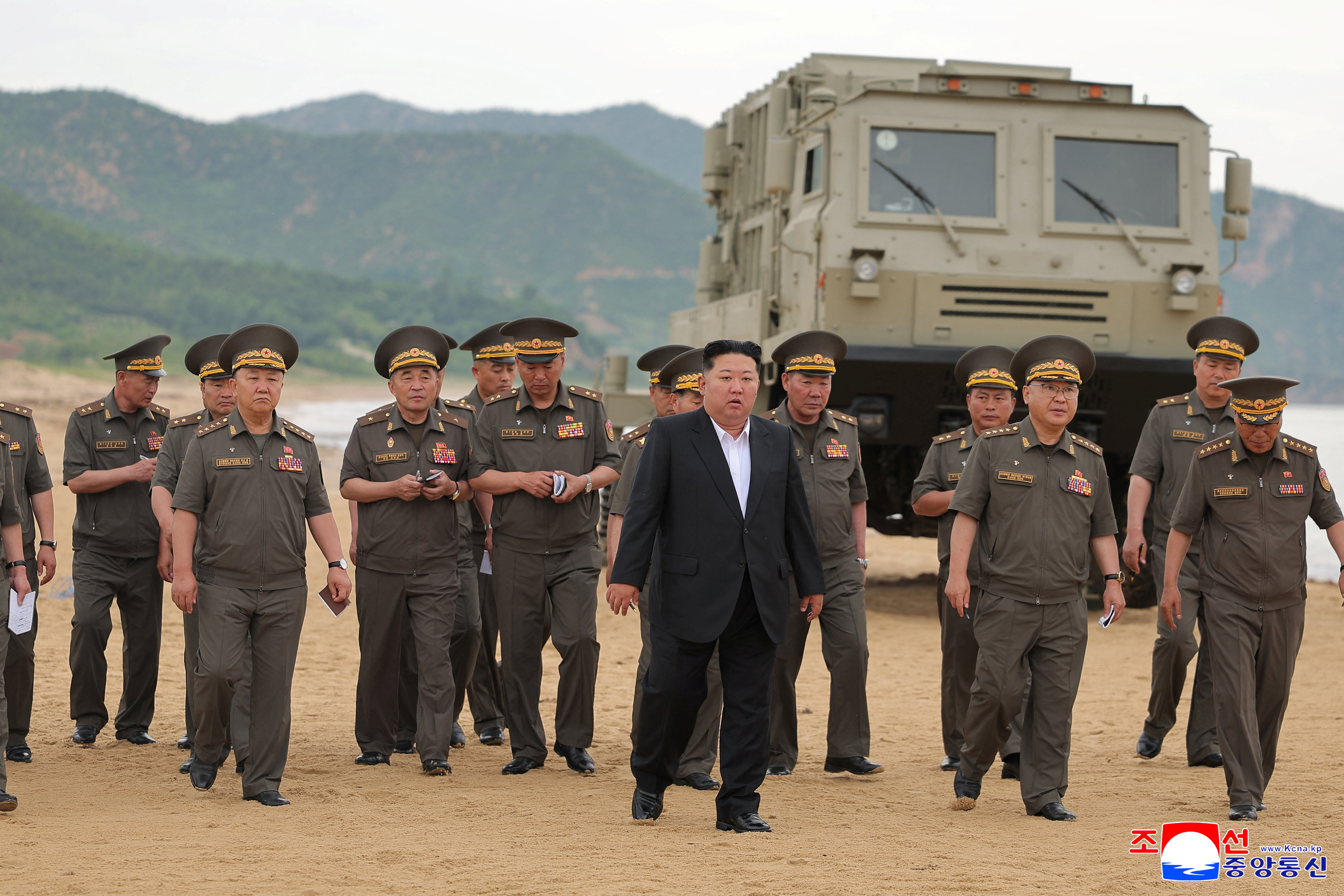 North Korean leader Kim Jong Un oversees the test of key weapons, involving an upgraded version of a 240-mm, 24-tube multiple rocket launcher system, tactical ballistic missiles, and a 155-mm self-propelled howitzer, in North Korea, June 25, 2026, in this picture released by North Korea's official Korean Central News Agency. KCNA via REUTERS ATTENTION EDITORS - THIS IMAGE WAS PROVIDED BY A THIRD PARTY. REUTERS IS UNABLE TO INDEPENDENTLY VERIFY THIS IMAGE. NO THIRD PARTY SALES. SOUTH KOREA OUT. NO COMMERCIAL OR EDITORIAL SALES IN SOUTH KOREA.