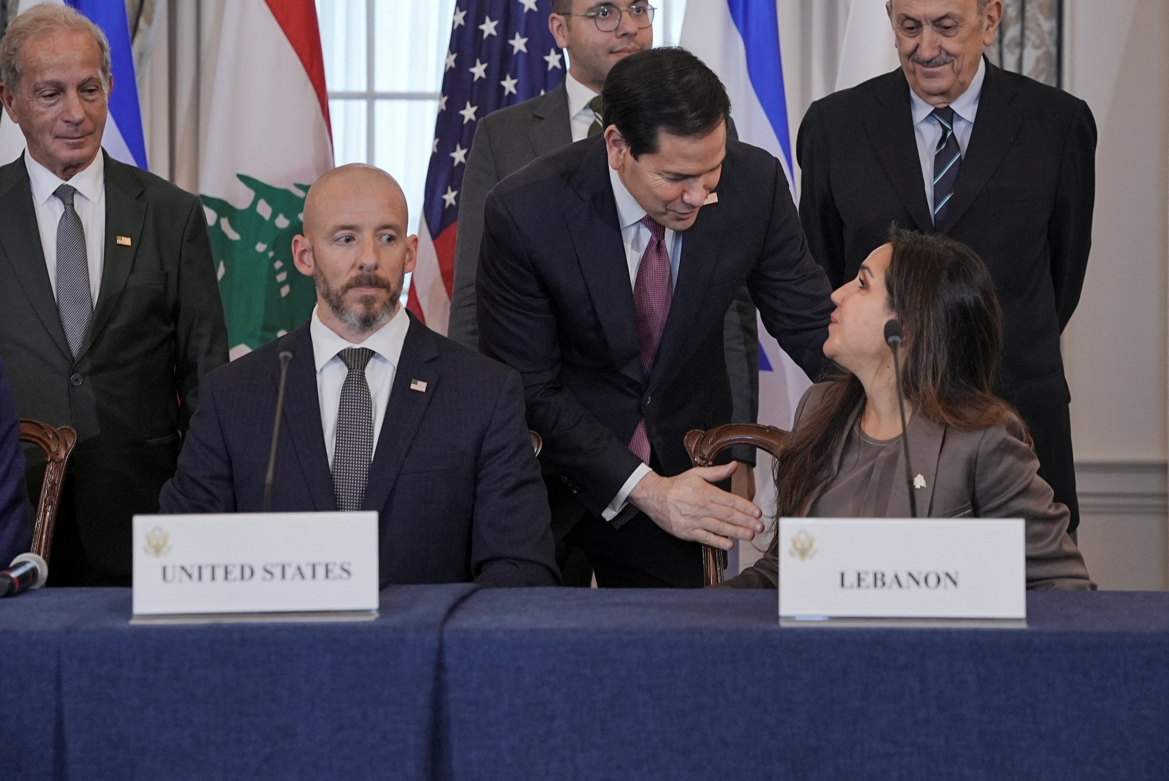 U.S. Secretary of State Marco Rubio speaks with Lebanon's Ambassador to the U.S. Nada Hamadeh next to State Department Counselor Daniel Holler and U.S. Ambassador to Lebanon Michel Issa, at the State Department in Washington, D.C., U.S., June 26, 2026. REUTERS/Ken Cedeno