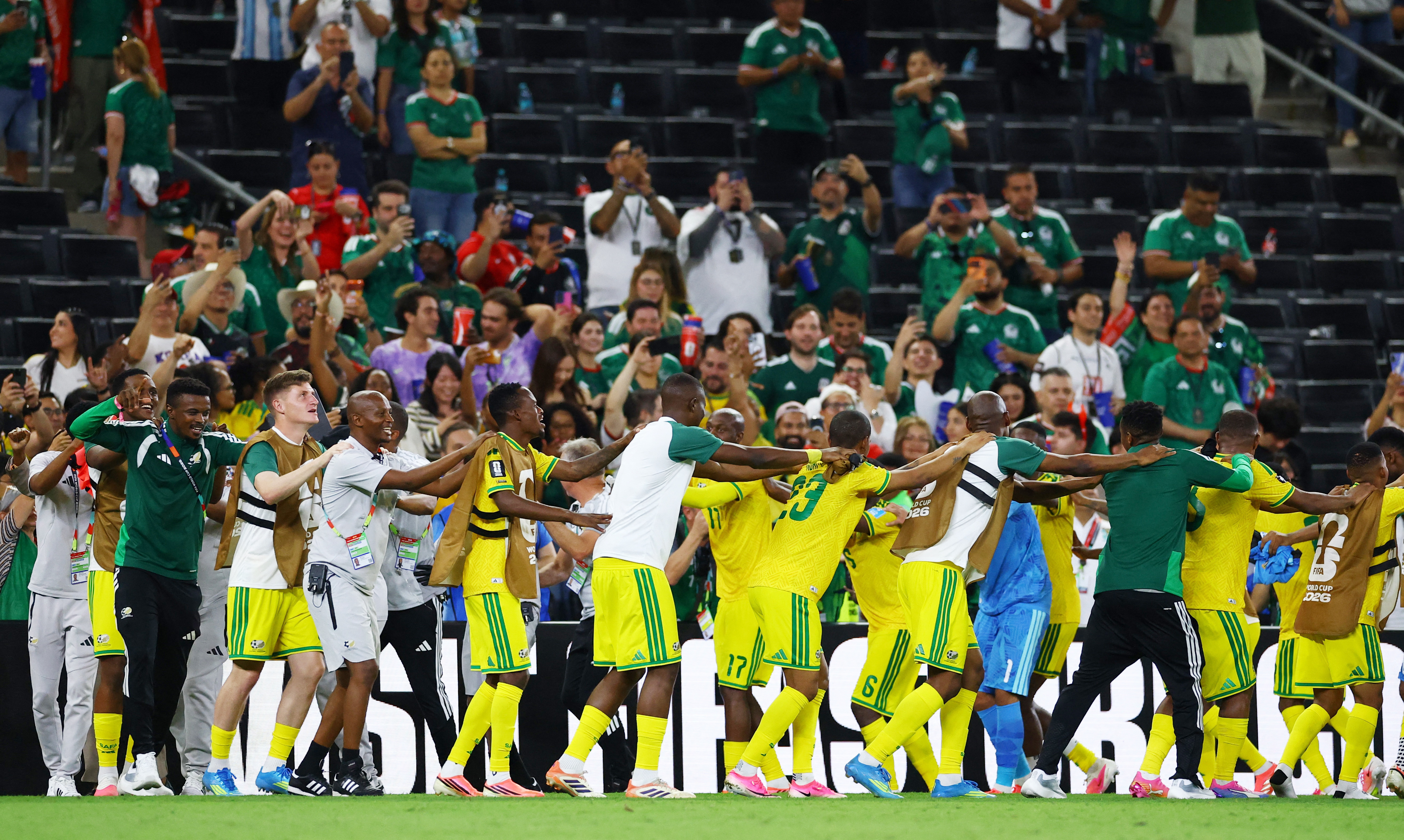 Soccer Football - FIFA World Cup 2026 - Group A - South Africa v South Korea - Estadio Monterrey, Monterrey, Mexico - June 24, 2026 South Africa players celebrate after the match REUTERS/Daniel Becerril