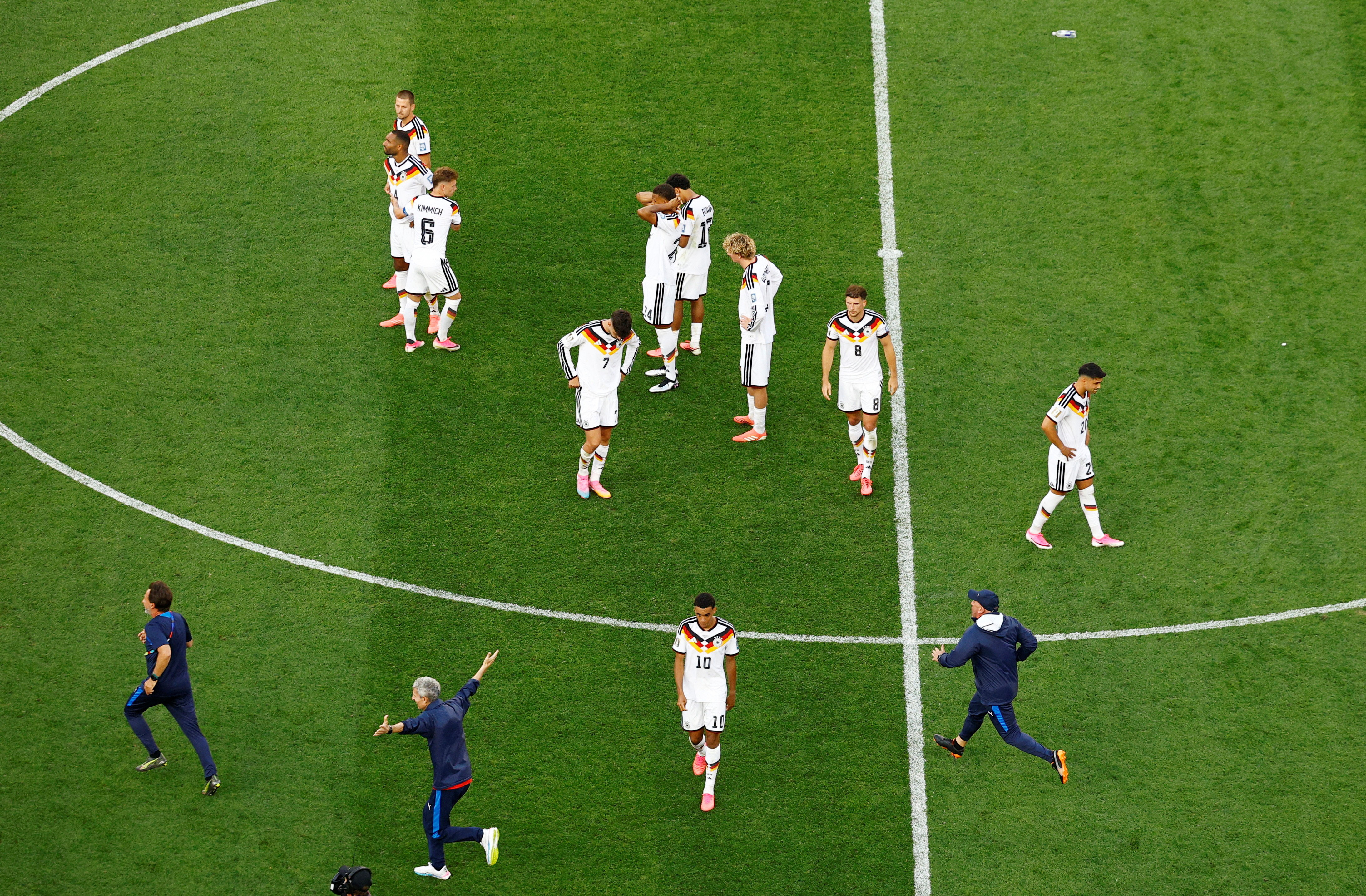 Soccer Football - FIFA World Cup 2026 - Round of 32 - Germany v Paraguay - Boston Stadium, Foxborough, Massachusetts, U.S. - June 29, 2026 Germany's Jamal Musiala with teammates look dejected after the match as Germany are eliminated from the World Cup REUTERS/Pilar Olivares TPX IMAGES OF THE DAY