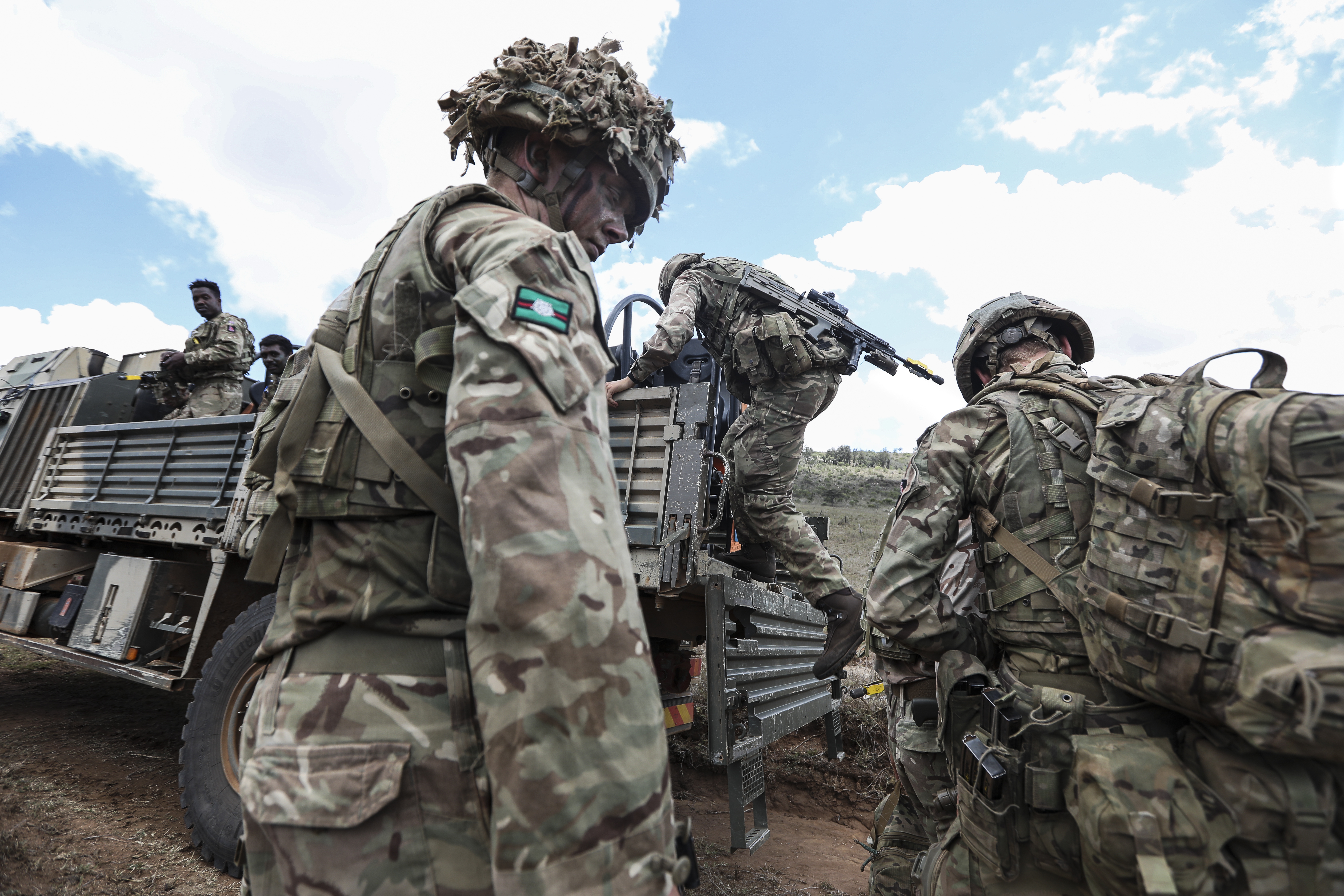 British soldiers under the British Army Training Unit Kenya (BATUK), in the field as they showcase a UK Battle Group training during Exercise Askari Storm, in Lolldaiga training area, Laikipia, Kenya, in November 2022 [Daniel Irungu/EPA]