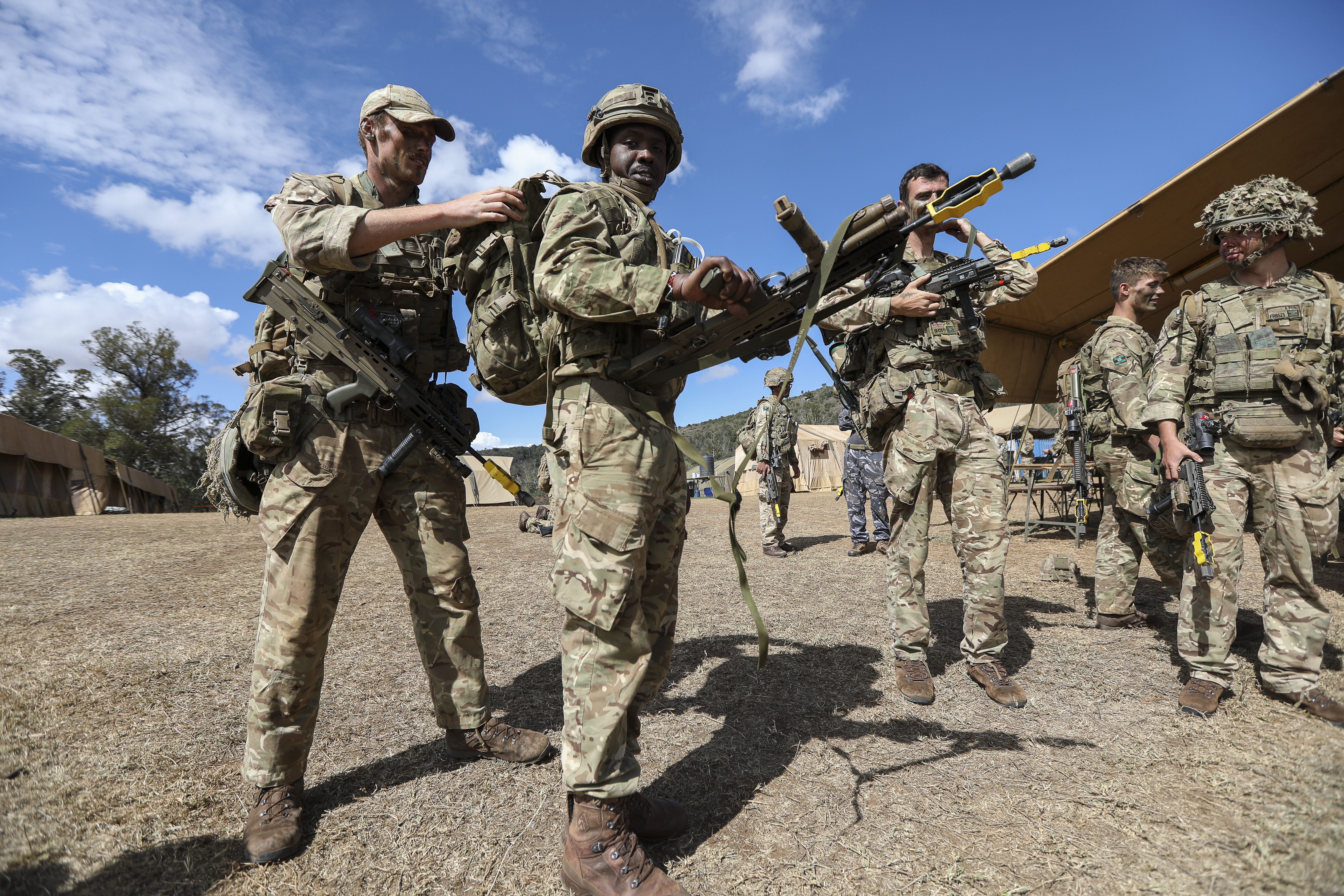 Members of the British Army Training Unit Kenya (BATUK) participate in an earlier military exercise with Kenya Defence Forces personnel in Kenya [DANIEL IRUNGU/EPA]