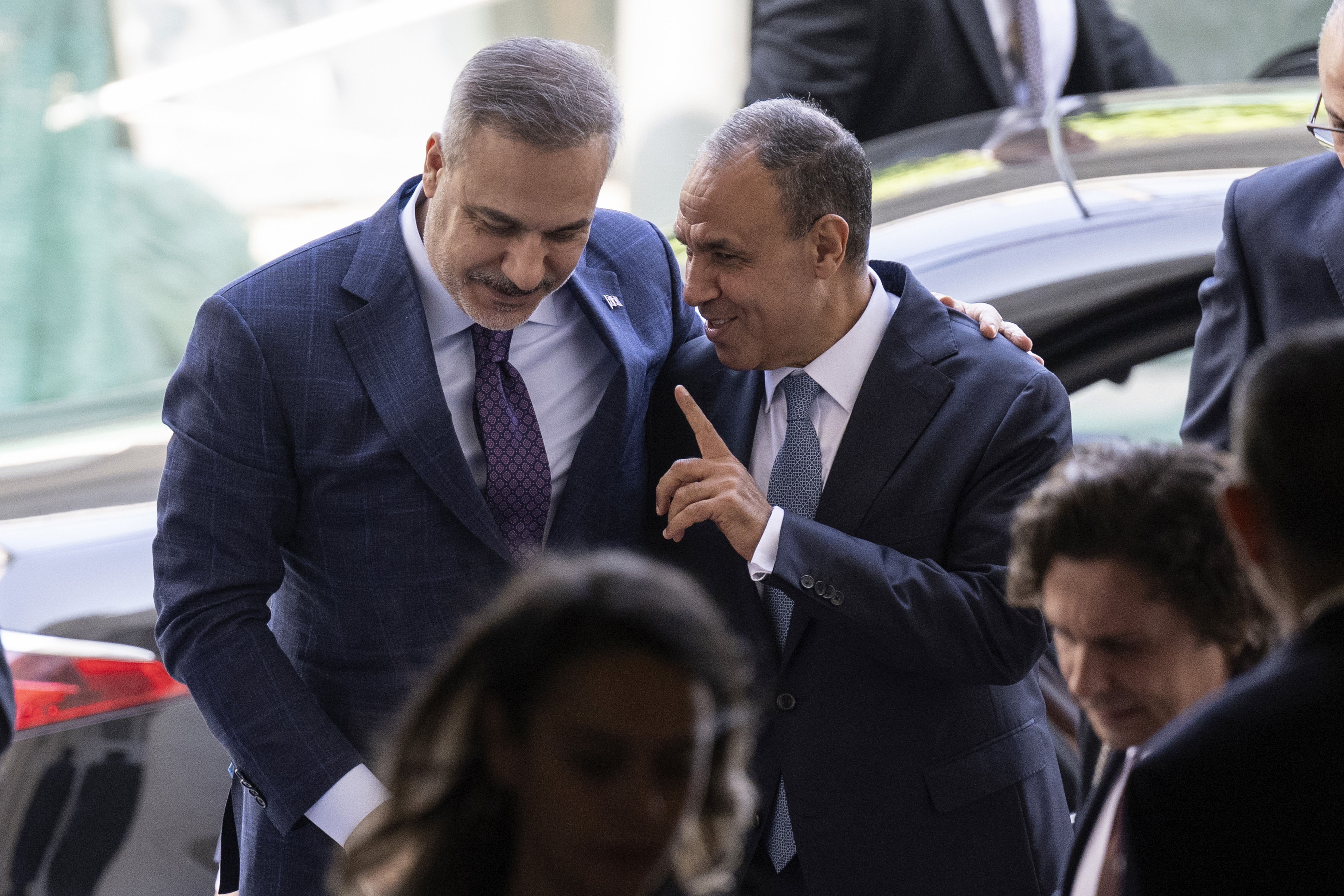 epa13053663 Egyptian Foreign Minister Badr Abdelatty (R) welcomes Turkish Foreign Minister Hakan Fidan (L) before a quadrilateral meeting at Tahrir Palace in Cairo, Egypt, 21 June 2026. EPA/MOHAMED HOSSAM
