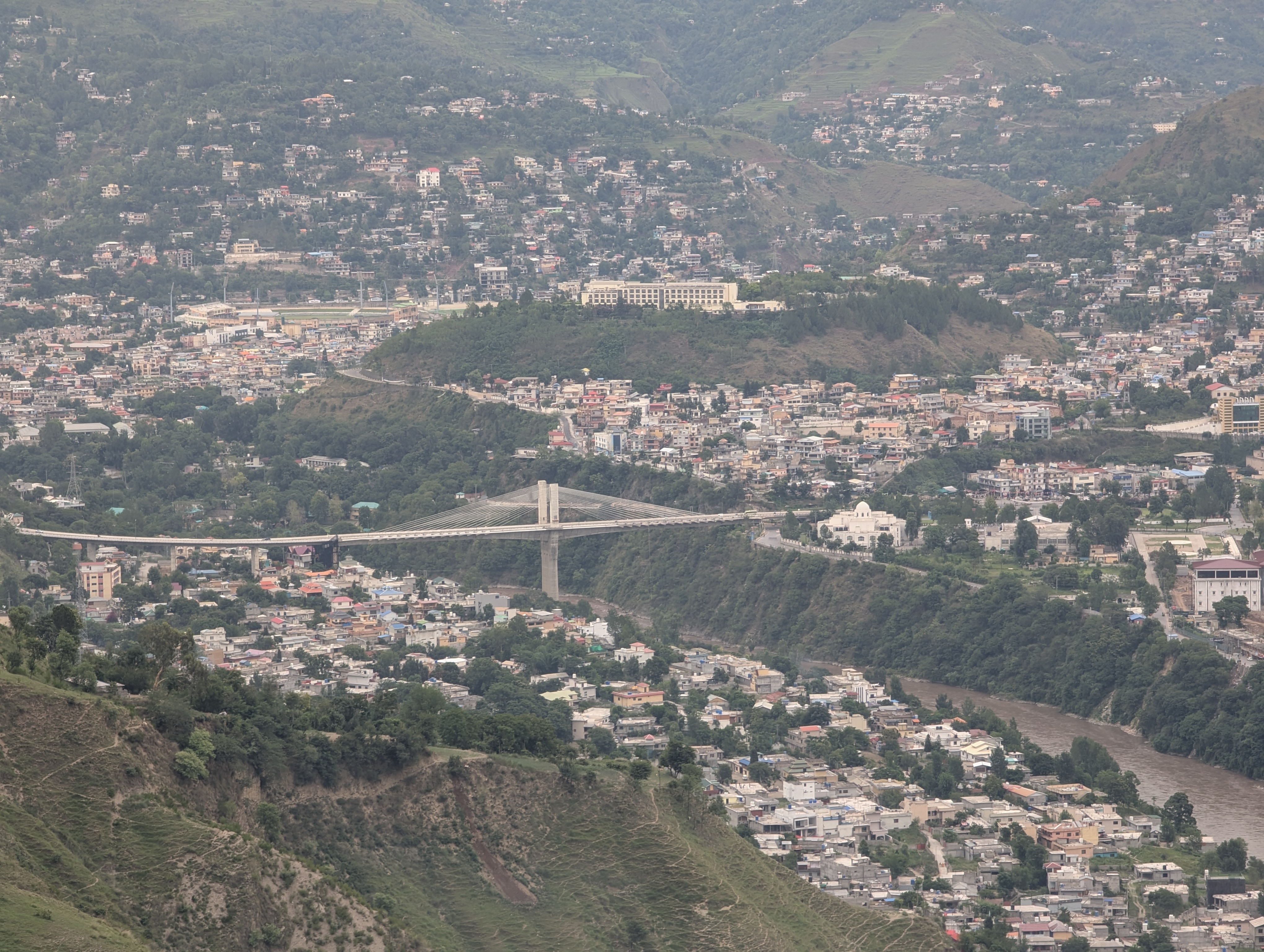 epa13113372 A view of Muzaffarabad, the capital of Pakistani - administered Kashmir, Pakistan, 15 July 2026. At least nine people, including two police officers, were killed in separate clashes between security forces and protesters in Pakistan-administered Kashmir as tensions continued over a planned protest march towards Muzaffarabad. The unrest follows the recent banning of the Jammu Kashmir Joint Awami Action Committee (JAAC), with authorities maintaining heightened security and restrictions on internet and phone services across the region. EPA/AMIRUDDIN MUGHAL